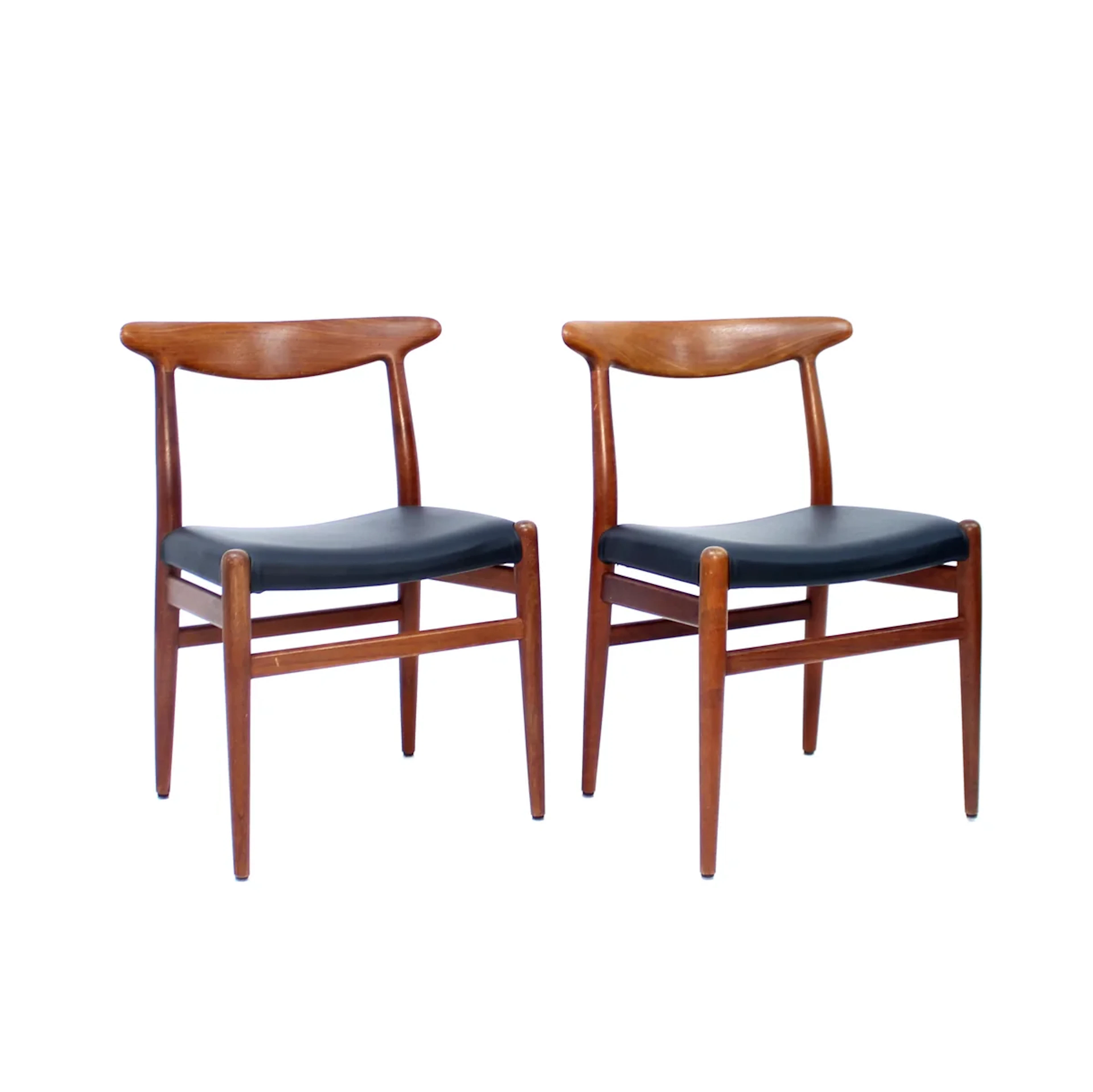 Hans Wegner, pair of Teak and leather dining chairs, model W2 for