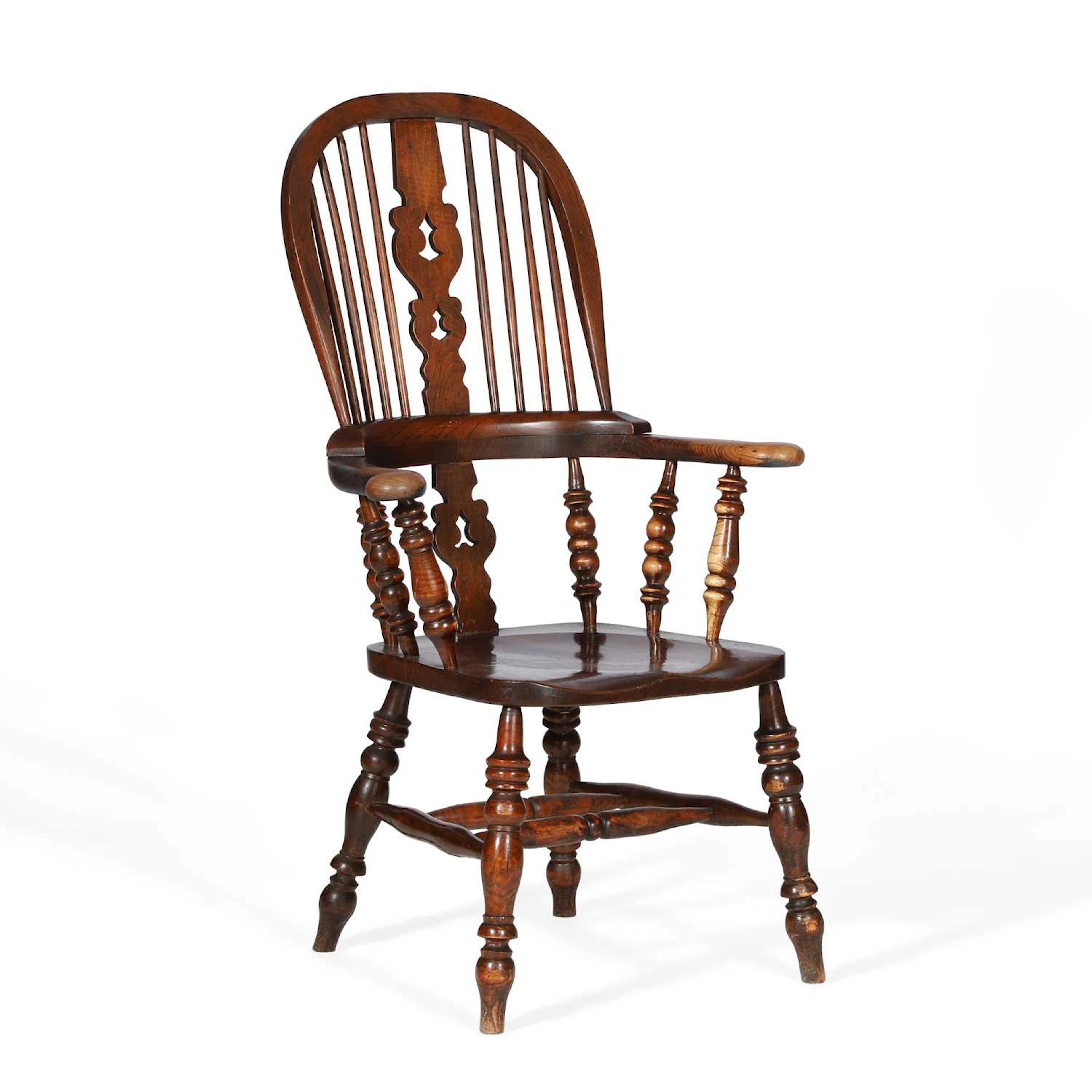 A VICTORIAN ELM BROAD ARM WINDSOR ARMCHAIR
