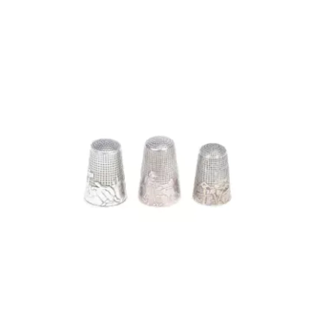 A FRENCH SILVER THIMBLE, TOGETHER WITH TWO FURTHER SILVER THIMBLES