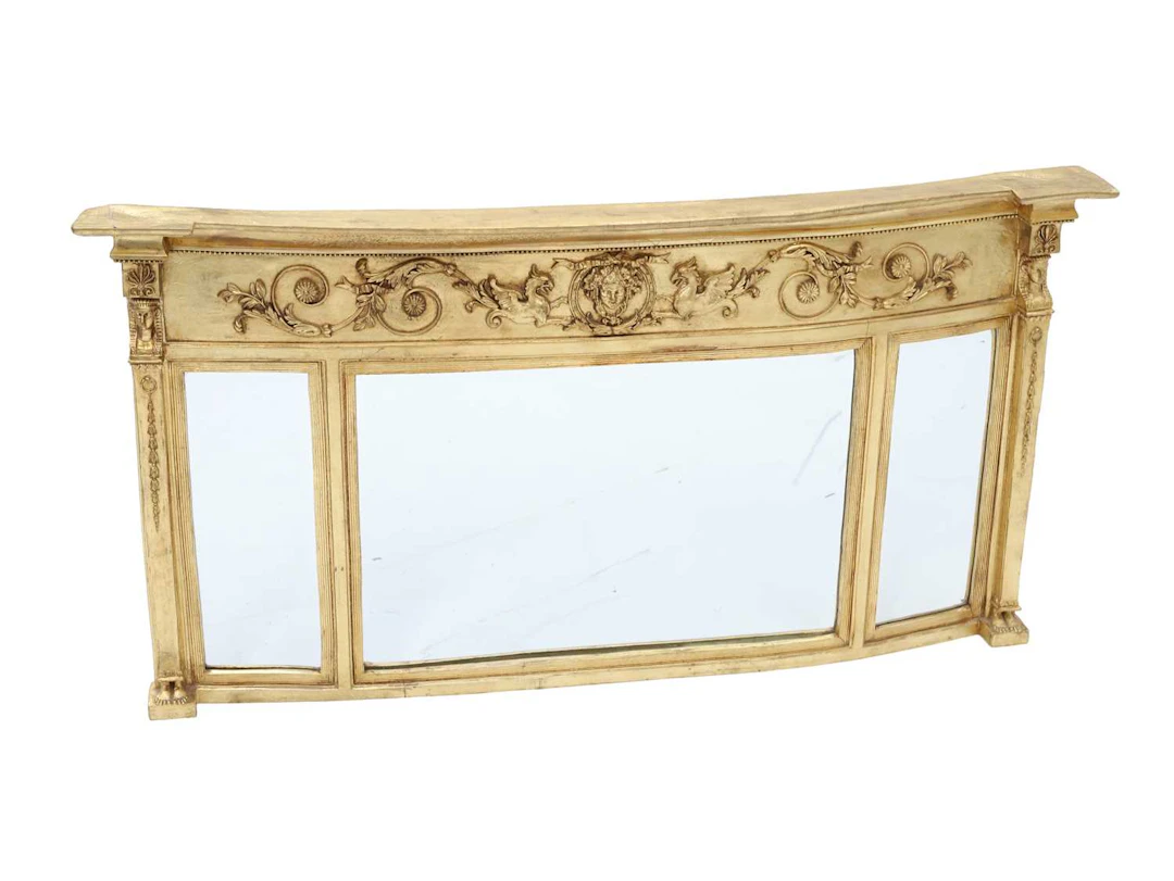 AN EMPIRE STYLE GILTWOOD AND GESSO OVERMANTEL MIRROR