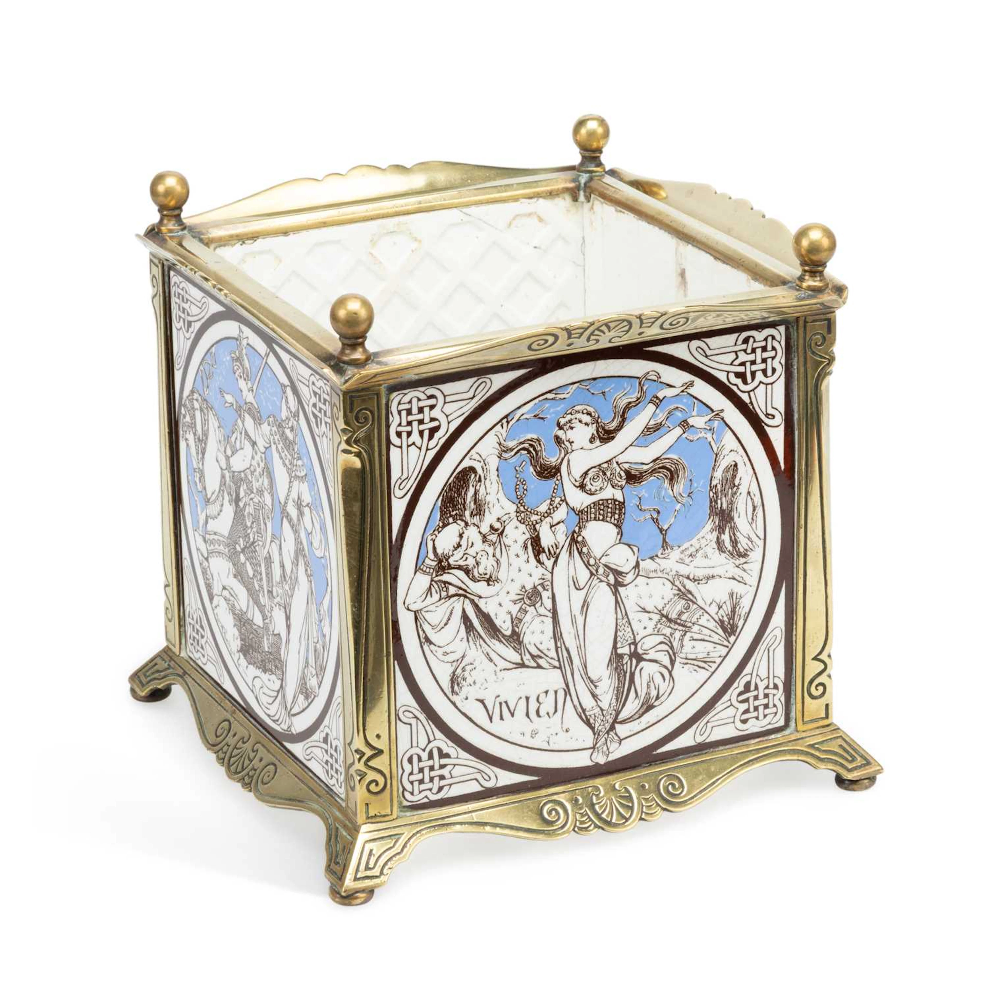 A BRASS-MOUNTED JARDINIÈRE SET WITH MINTON TILES