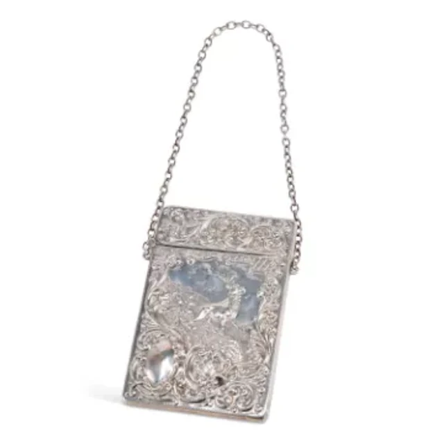 AN EDWARDIAN SILVER CARD CASE
