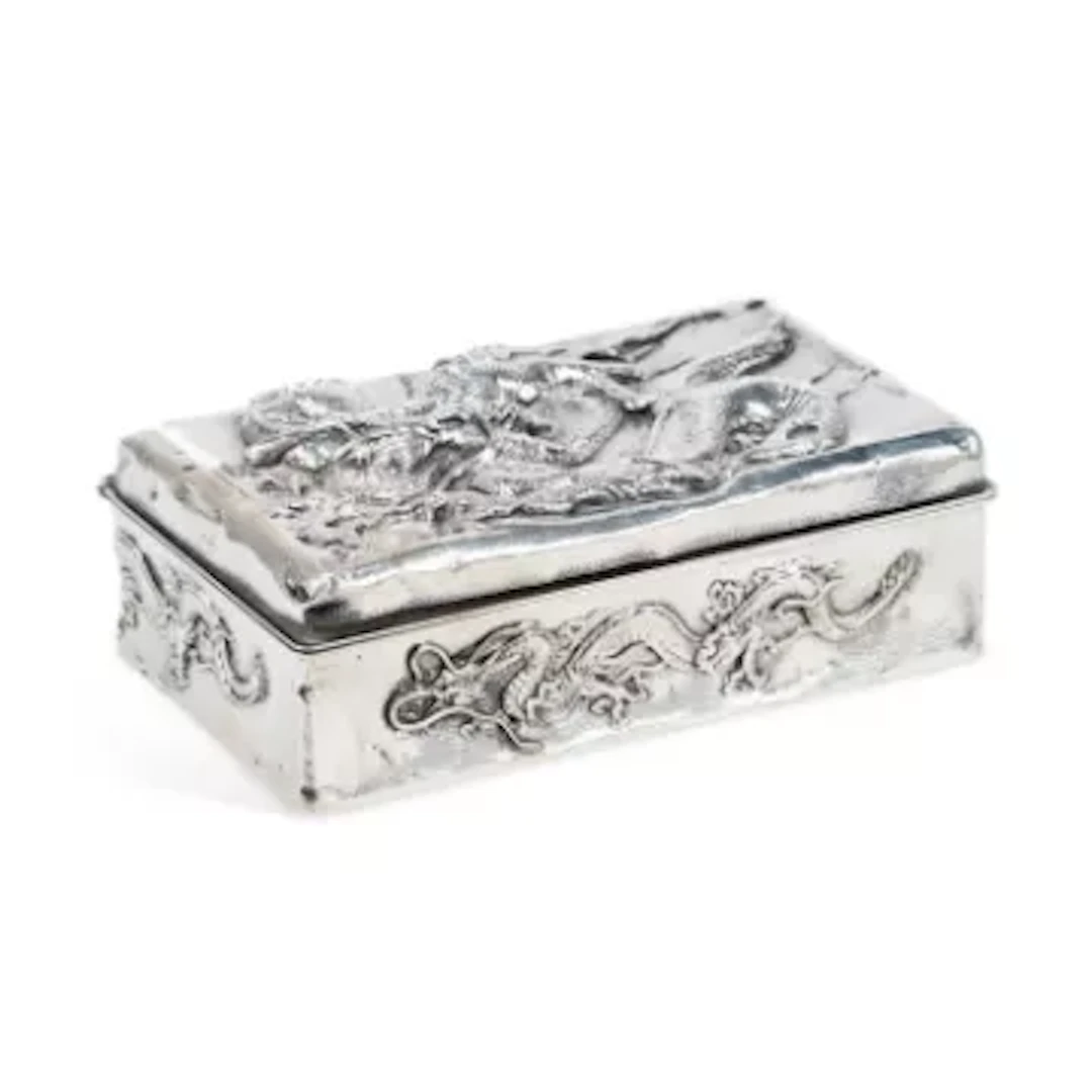 A JAPANESE SILVER CIGAR BOX