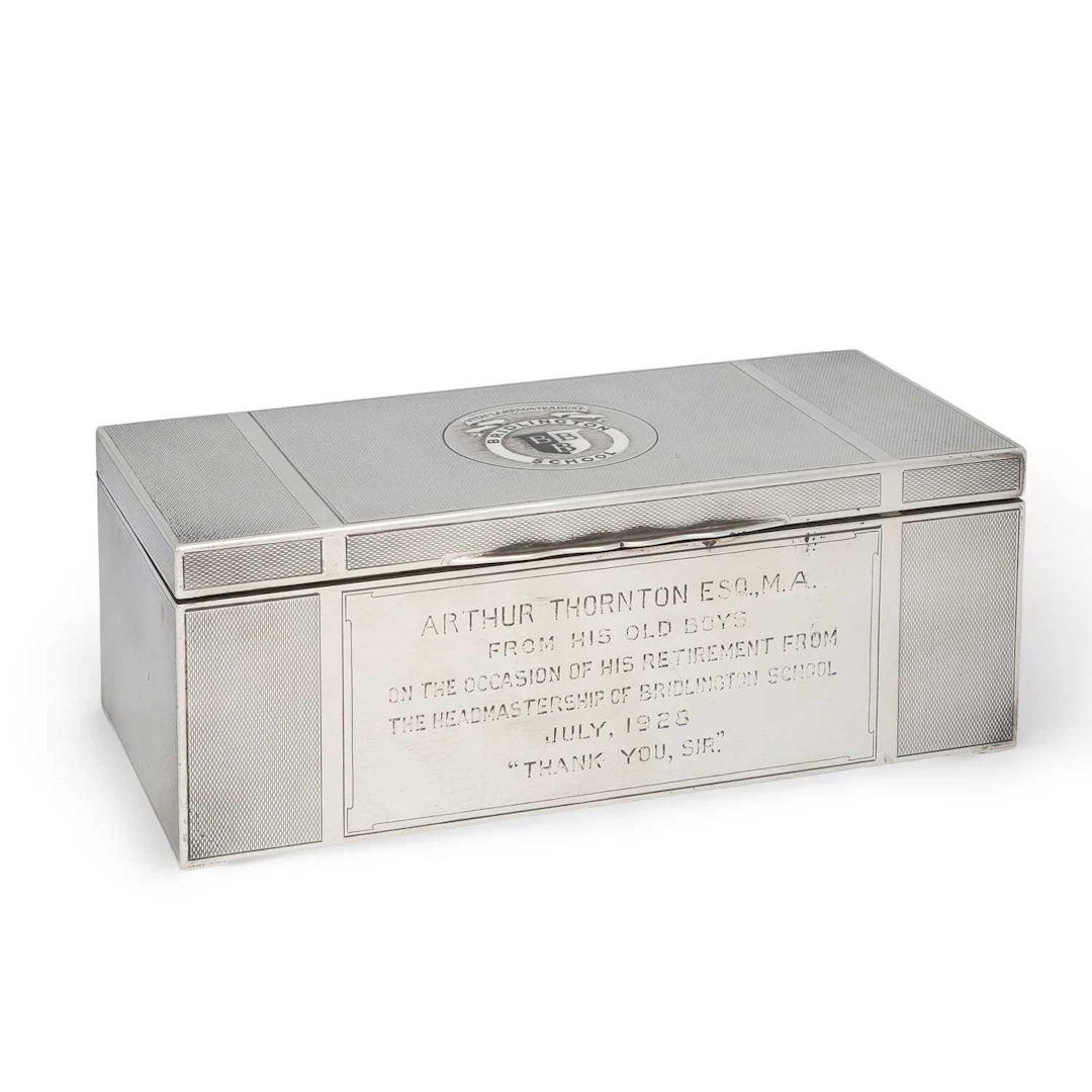A GEORGE V SILVER CIGARETTE BOX