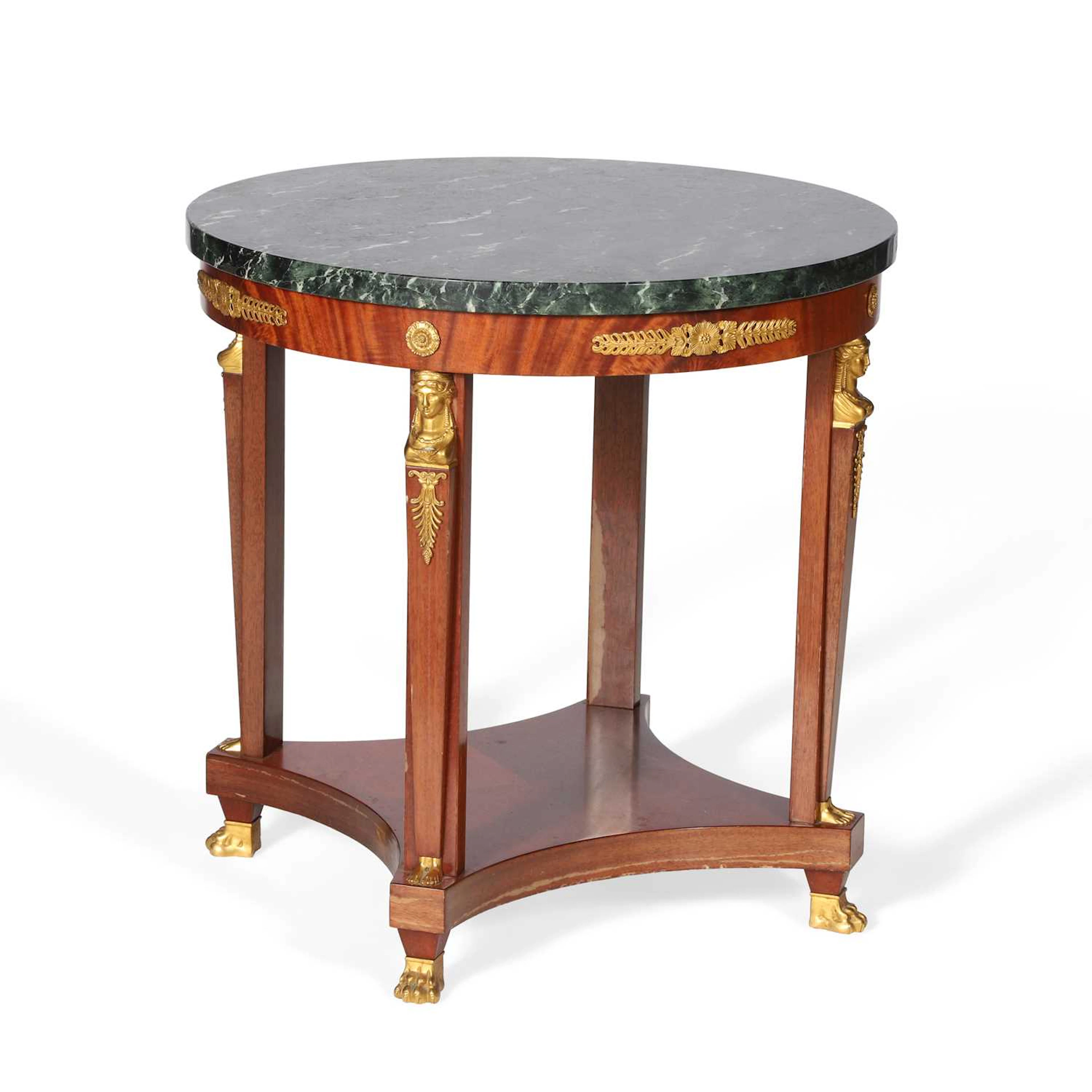 AN EMPIRE STYLE MAHOGANY AND GILT METAL MOUNTED CENTRE TABLE