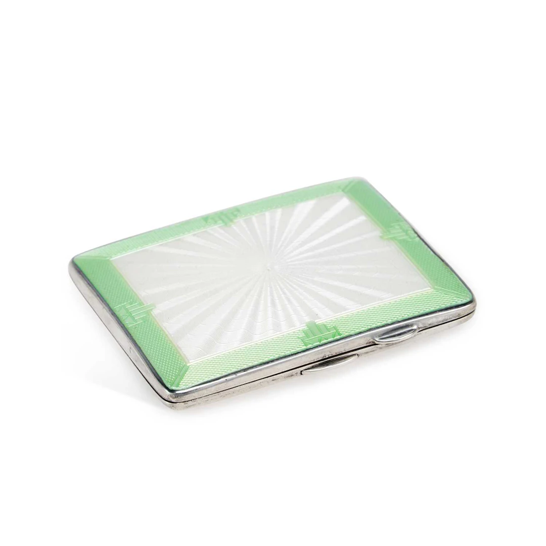 AN ART DECO SILVER AND ENAMEL CIGARETTE CASE