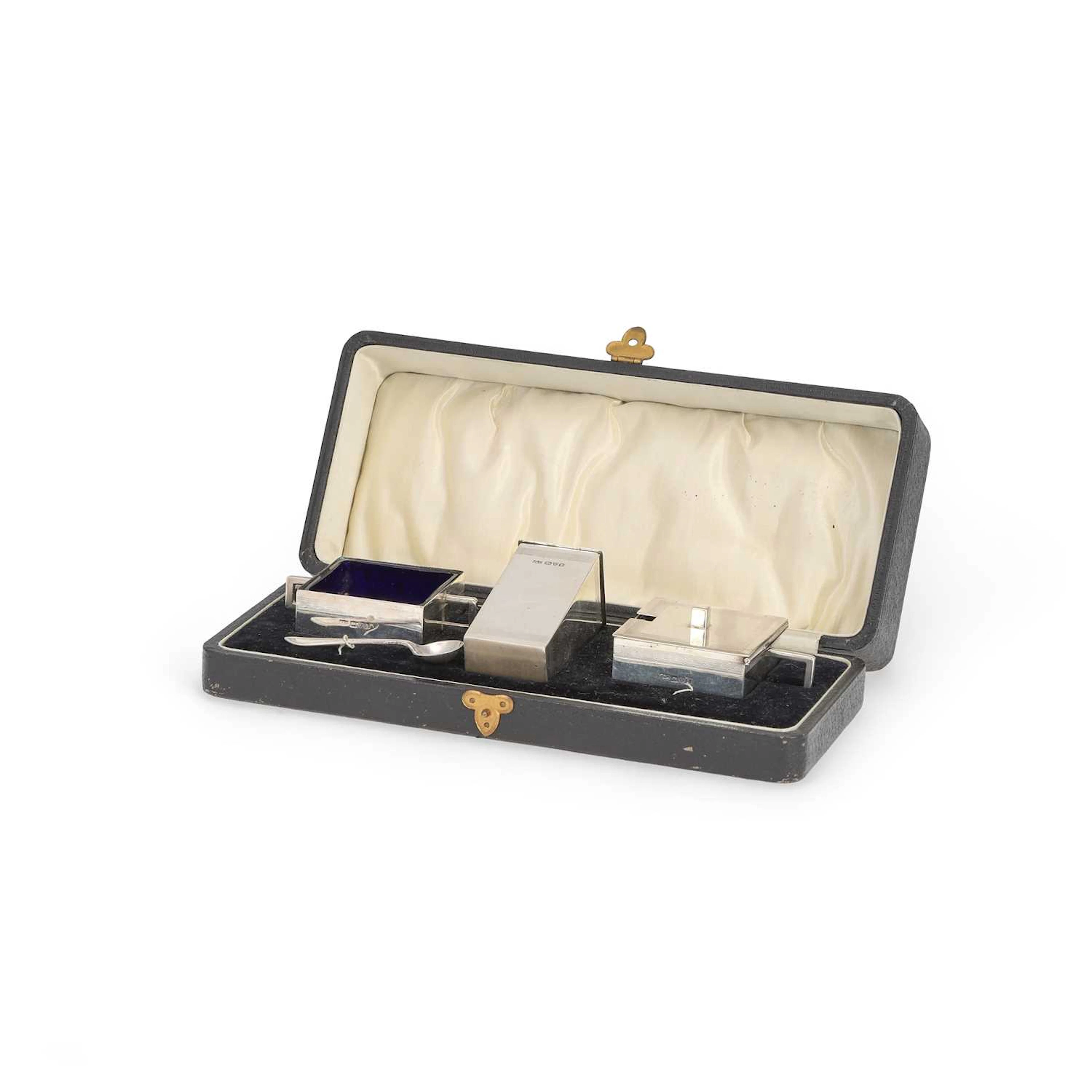 AN ART DECO SILVER THREE-PIECE CONDIMENT SET