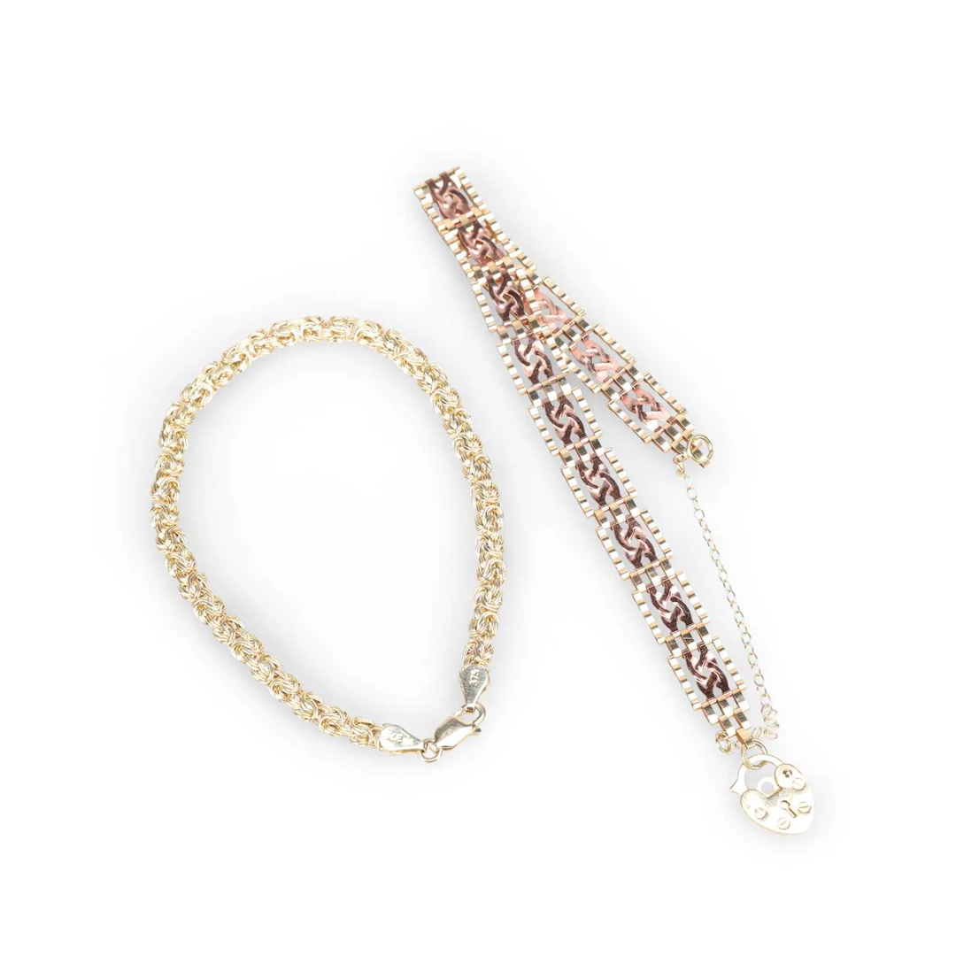 TWO 9 CARAT GOLD BRACELETS