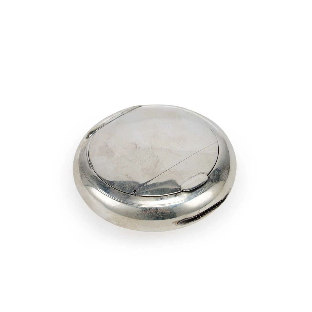 A GEORGE V SILVER NOVELTY 'SQUEEZE-SIDED' COMBINATION TOBACCO BOX AND VESTA