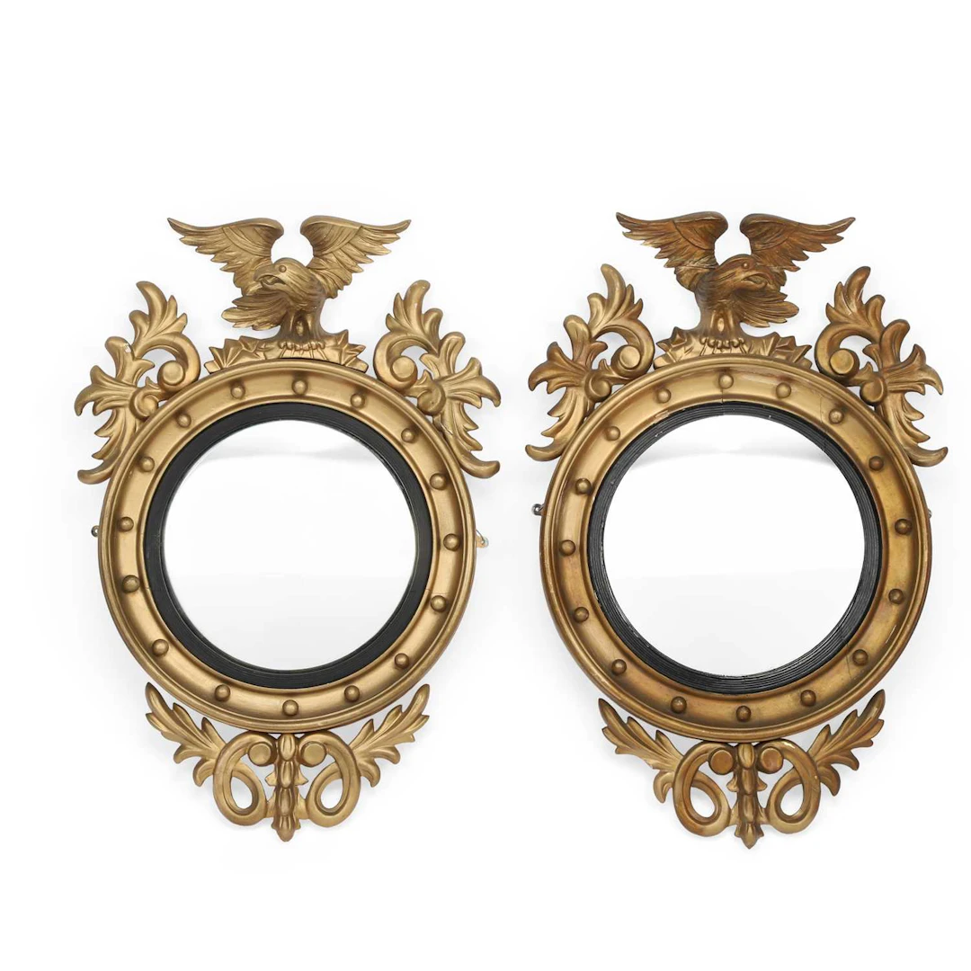 A PAIR OF REGENCY STYLE GILTWOOD CONVEX MIRRORS