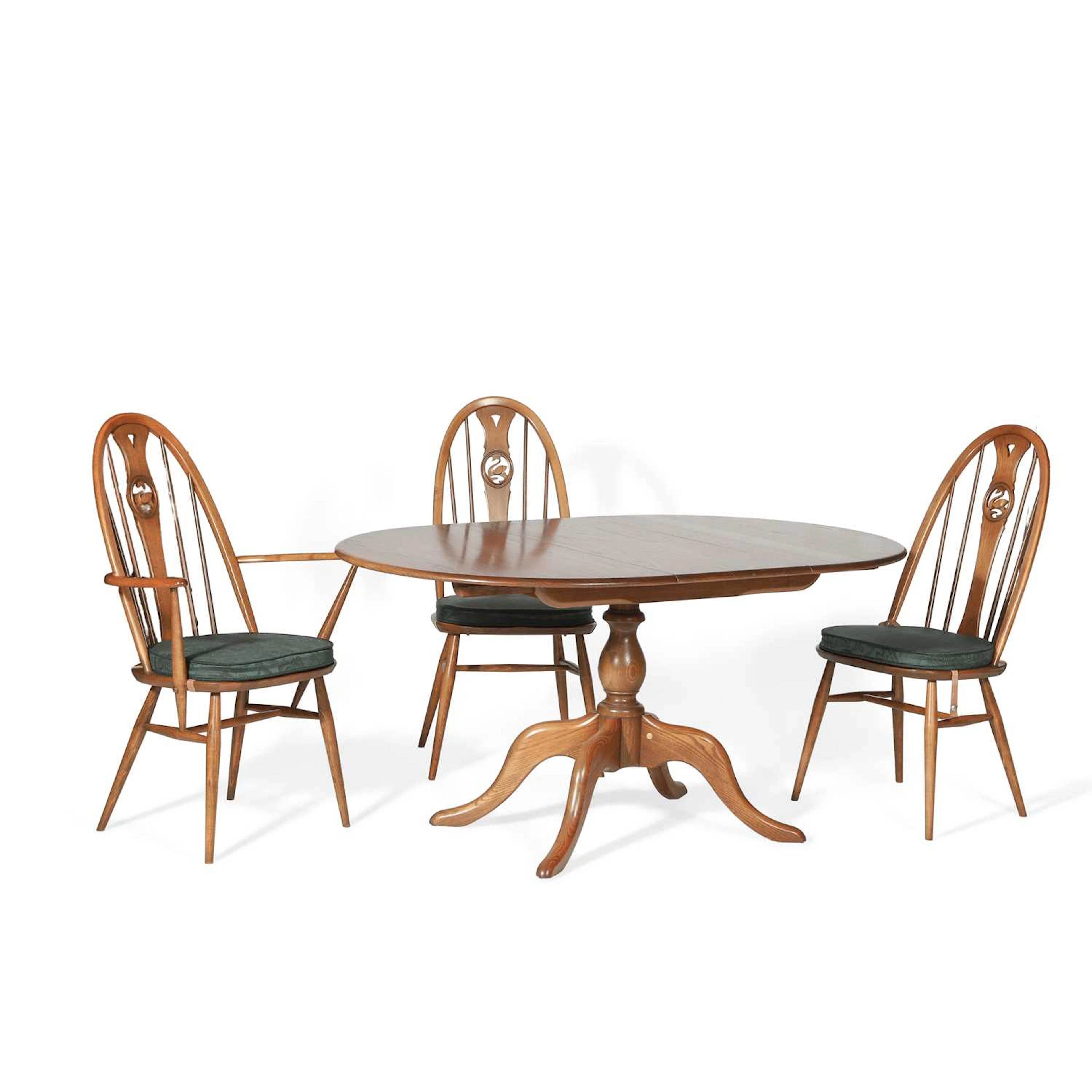 AN ERCOL DINING TABLE AND THREE CHAIRS