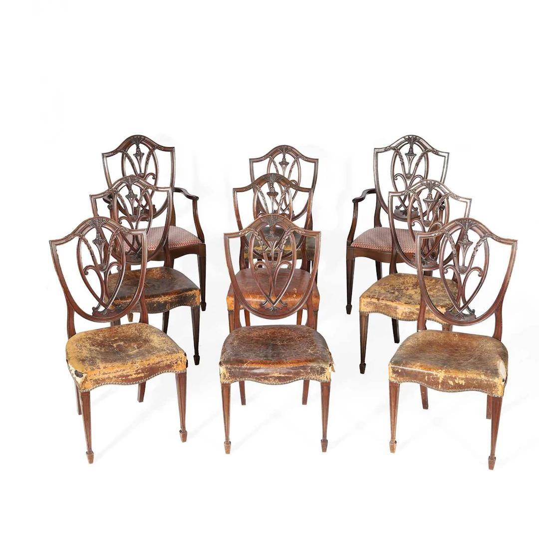 NINE HEPPLEWHITE STYLE MAHOGANY DINING CHAIRS
