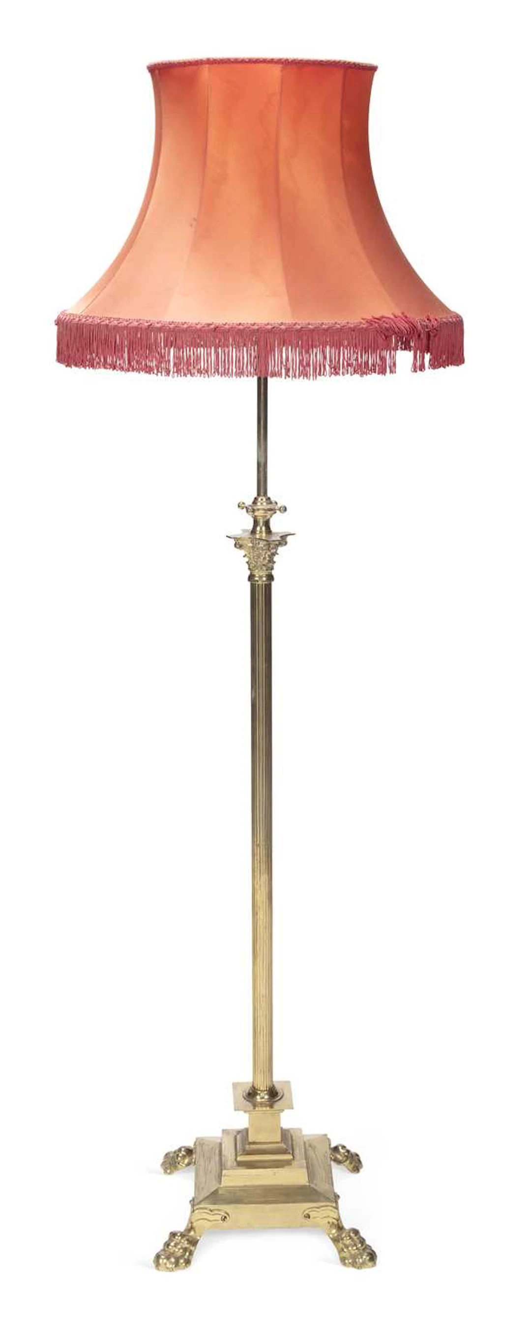 AN EARLY 20TH CENTURY BRASS STANDARD LAMP