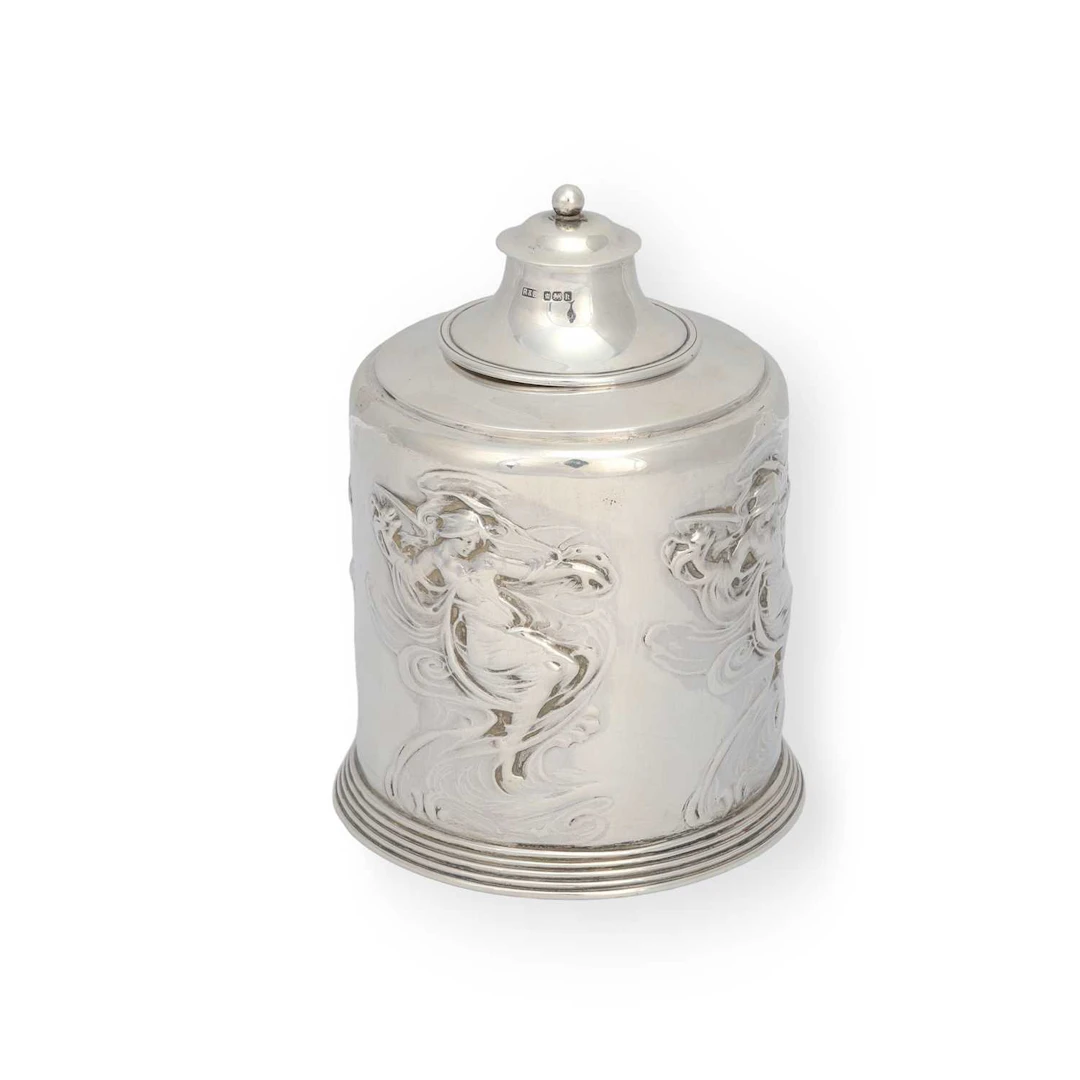 AN EDWARDIAN ART NOUVEAU SILVER TEA CADDY