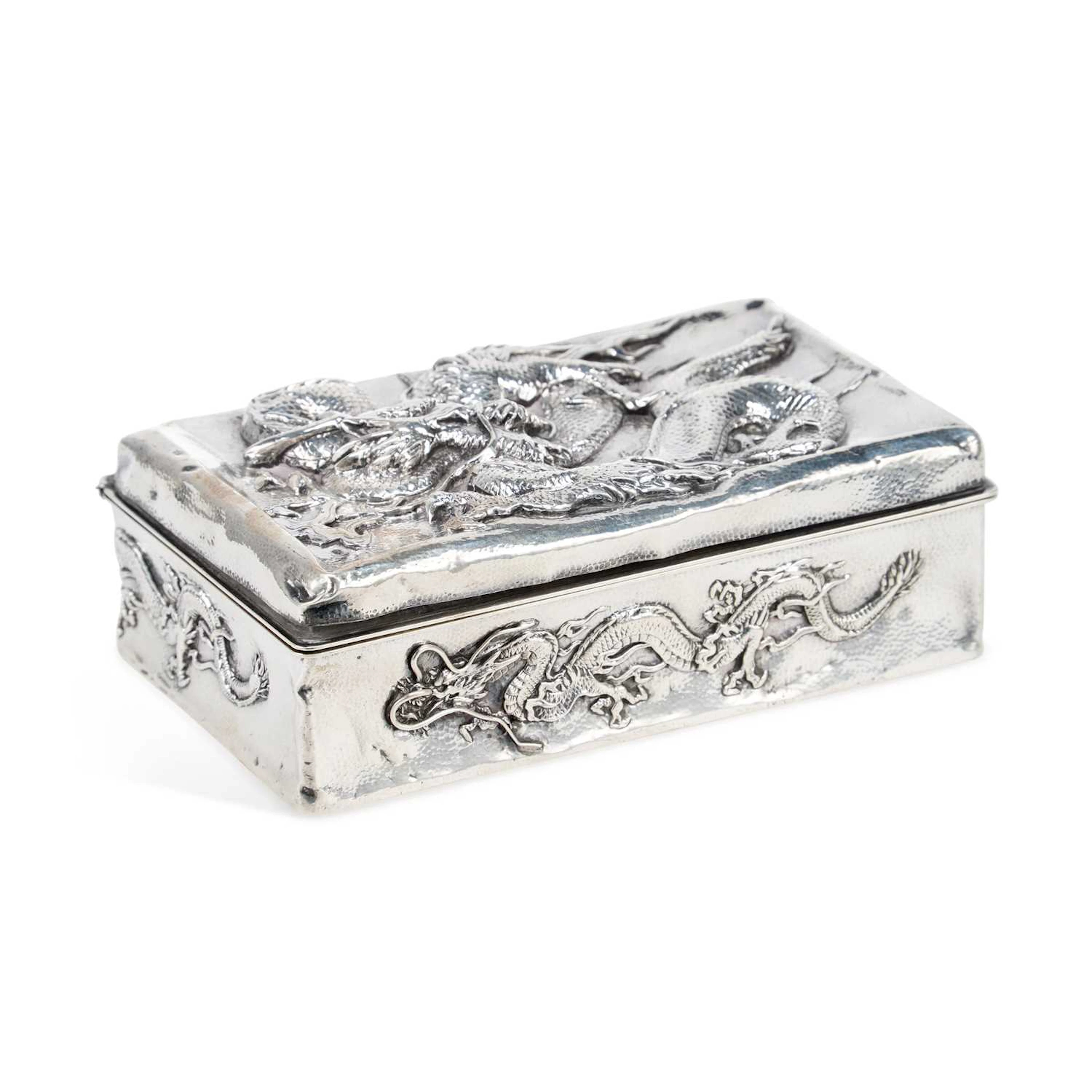 A JAPANESE SILVER CIGAR BOX