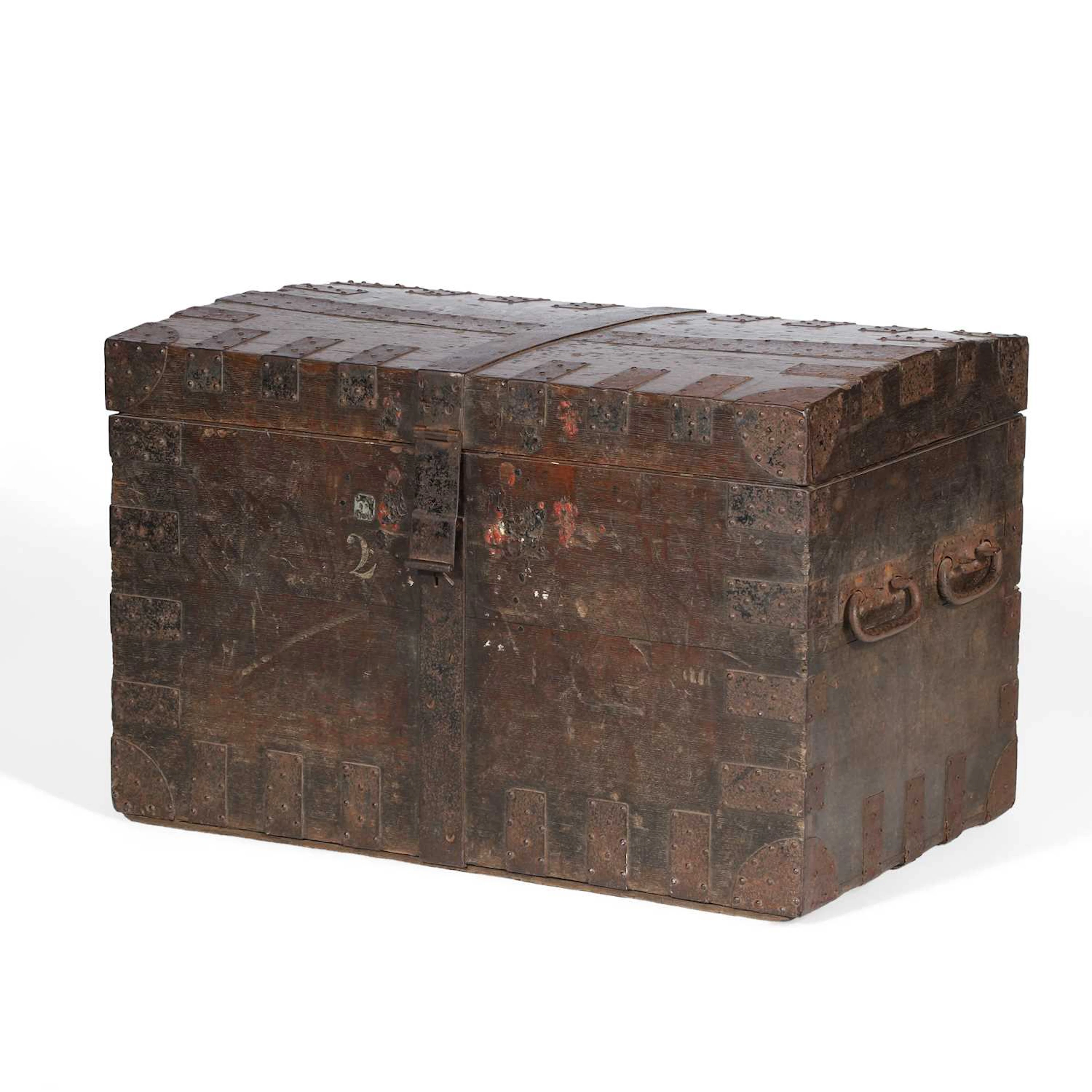 AN IRON BOUND OAK CHEST