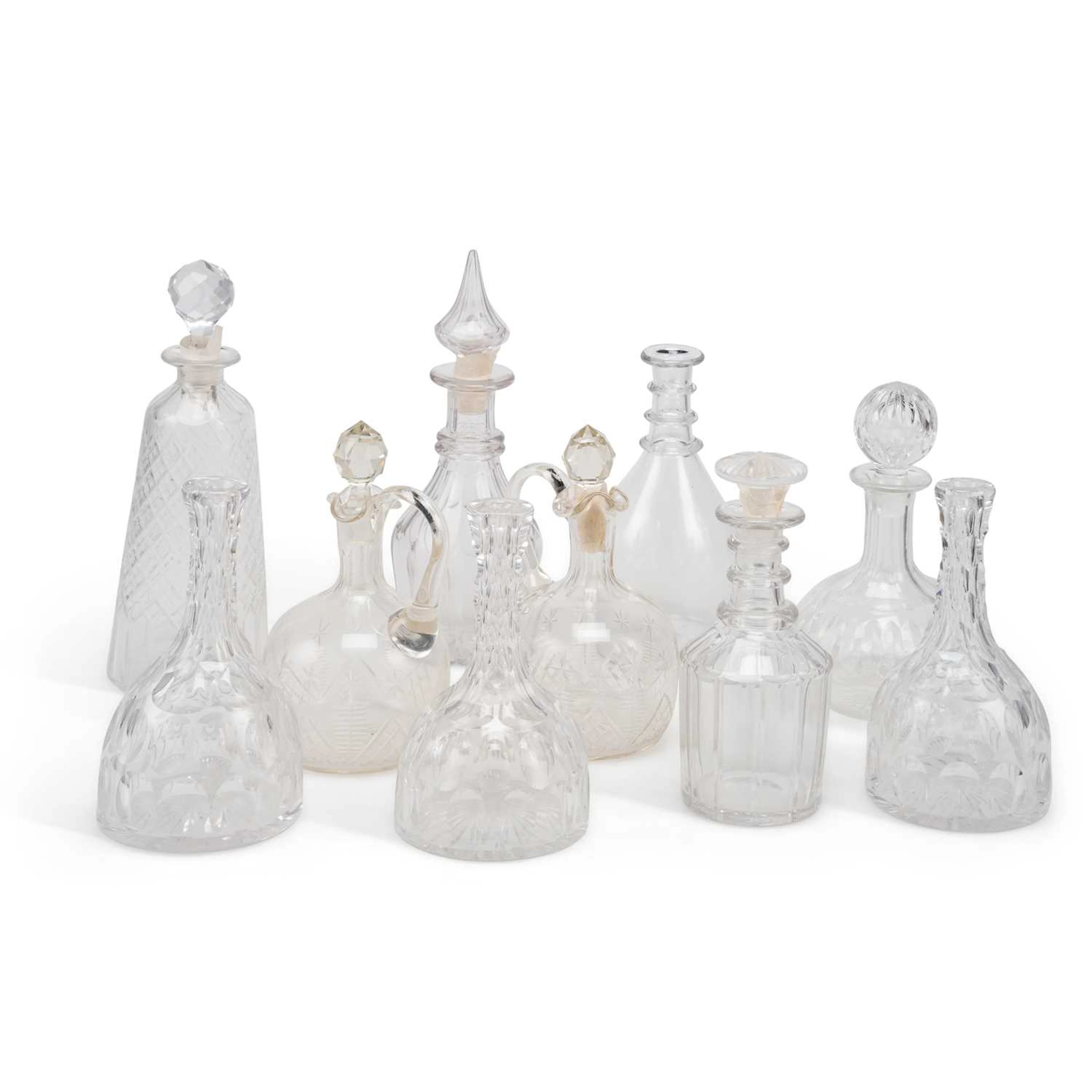 A COLLECTION OF CUT-GLASS DECANTERS