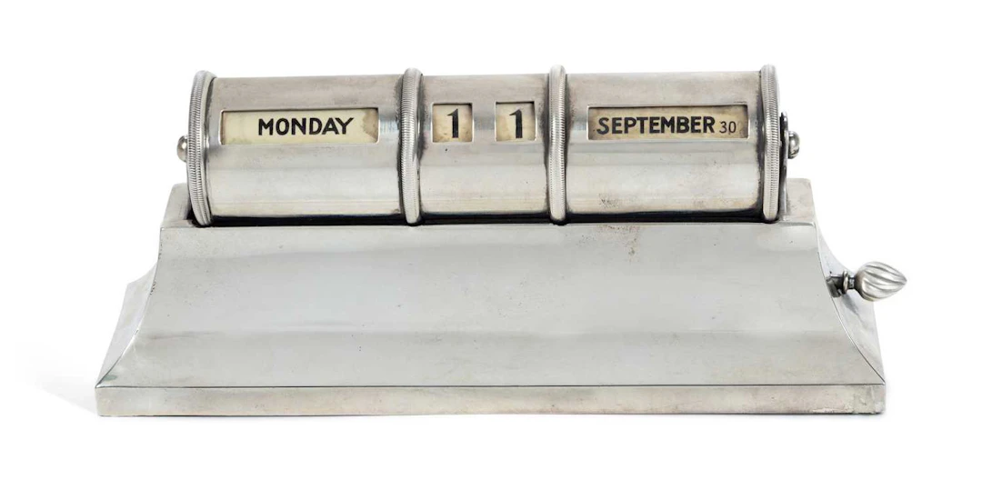 A GEORGE V SILVER DESK CALENDAR