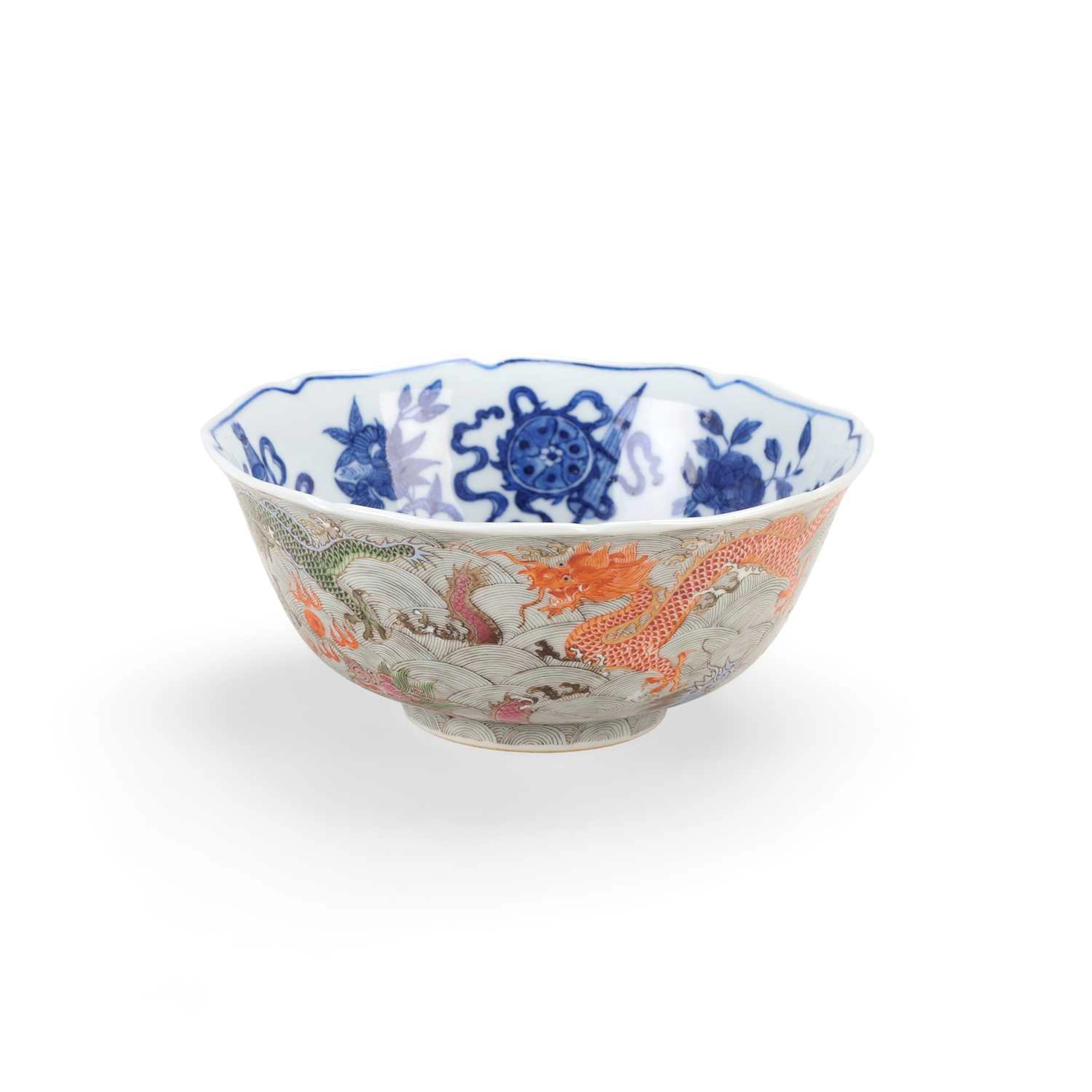 A CHINESE FAMILLE ROSE DRAGON BOWL