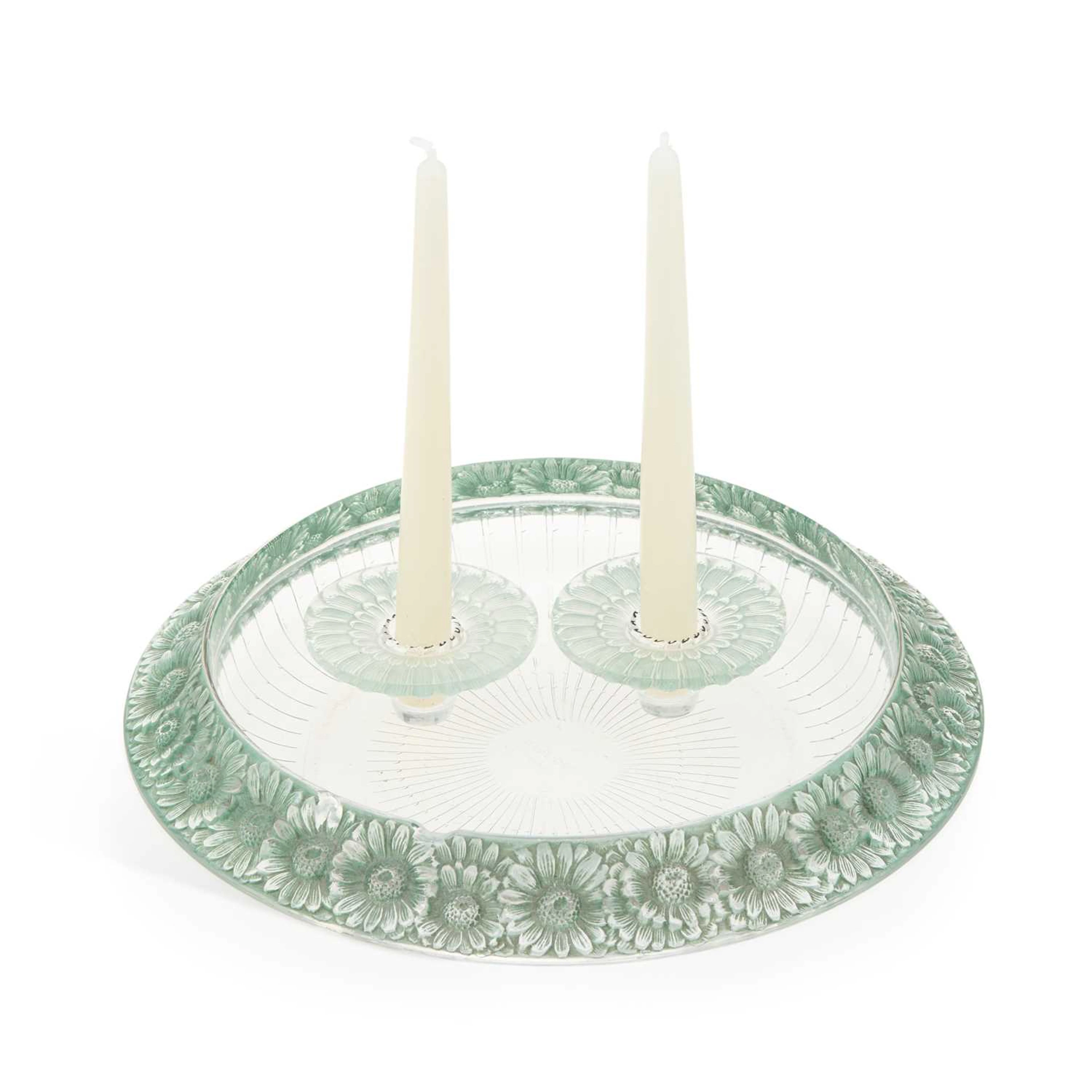RENÉ LALIQUE (FRENCH, 1860-1945) A 'MARGUERITES' BOWL AND TWO CANDLE HOLDERS