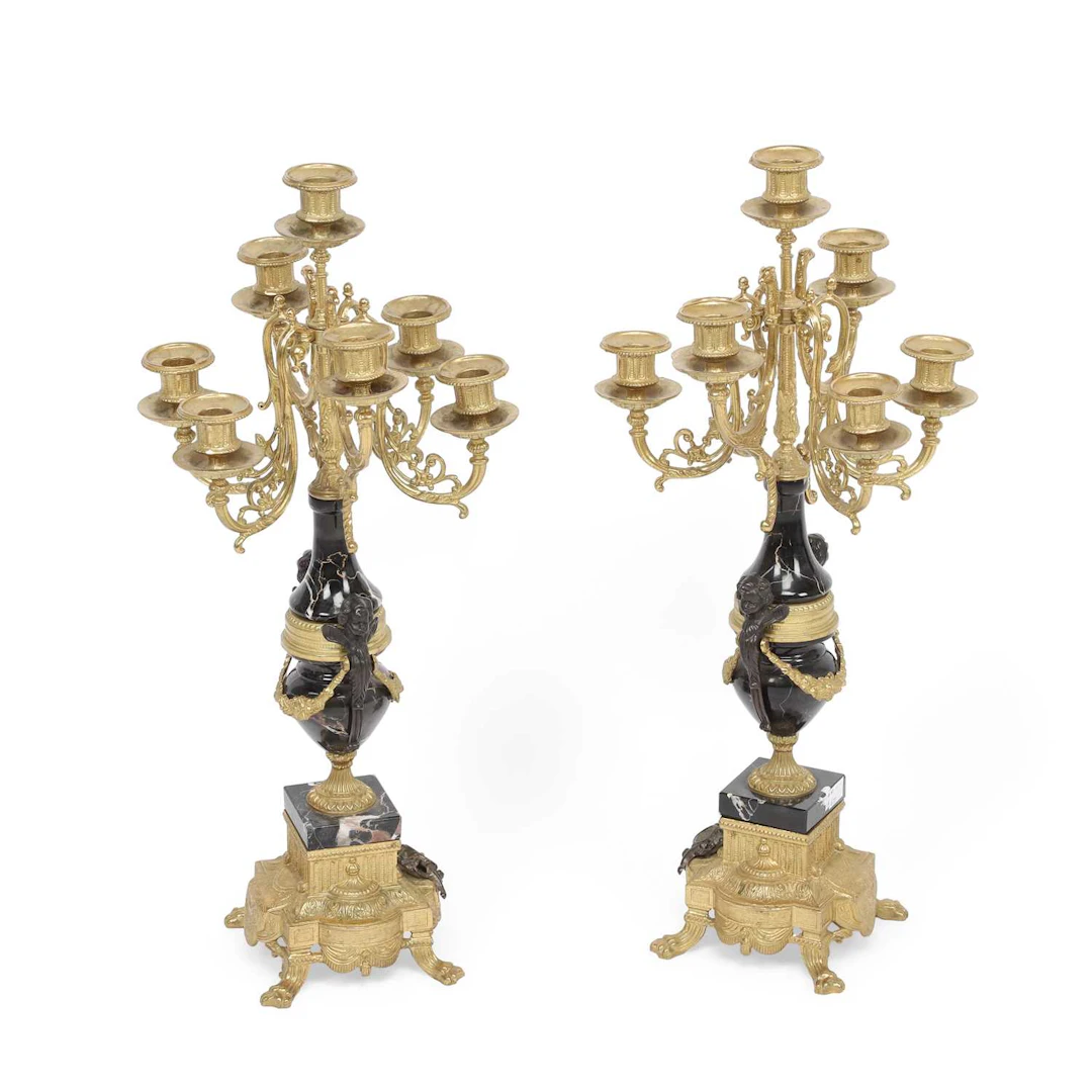A PAIR OF GILT METAL AND MARBLE SEVEN-LIGHT CANDELABRA
