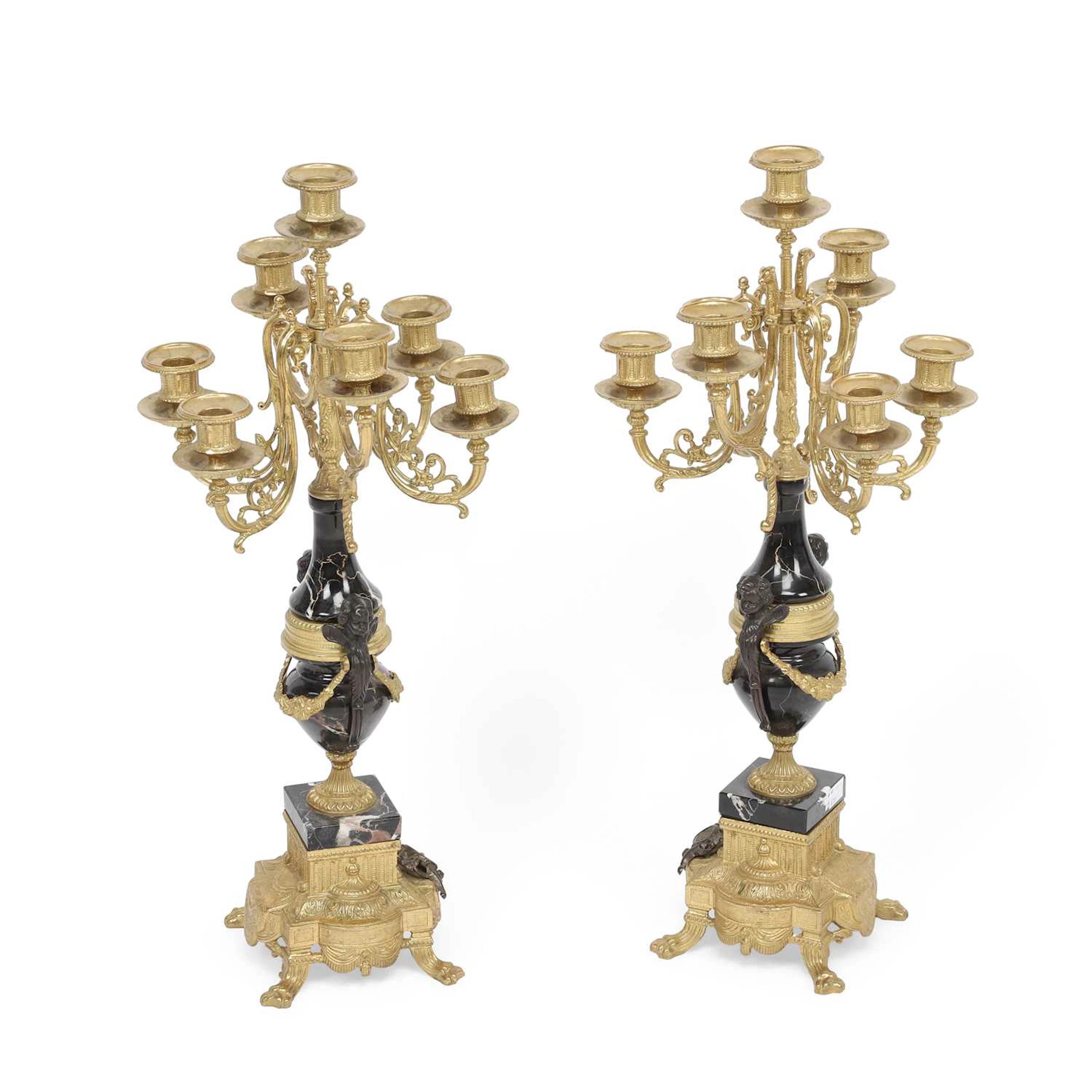 A PAIR OF GILT METAL AND MARBLE SEVEN-LIGHT CANDELABRA