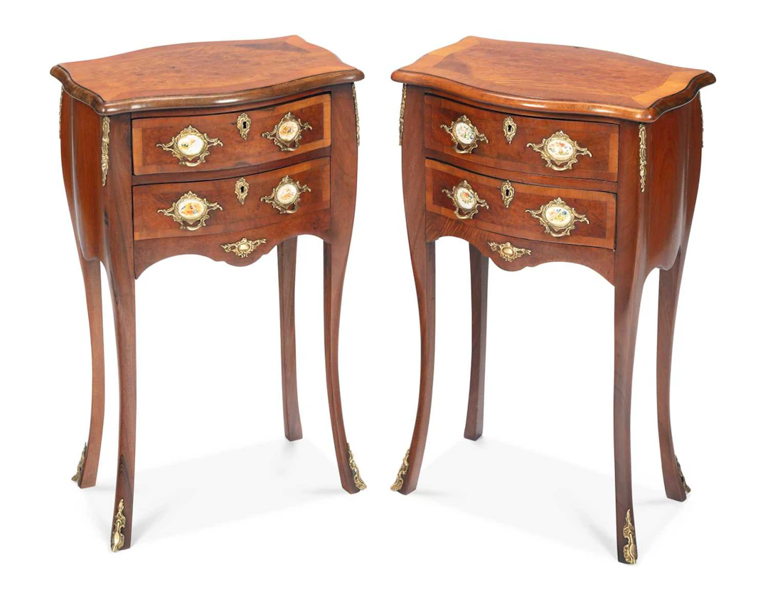 A PAIR OF WALNUT BEDSIDE COMMODES IN THE LOUIS XV TASTE