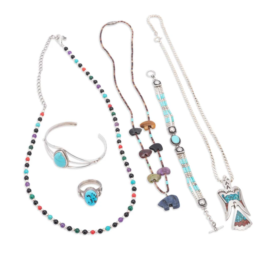 A COLLECTION OF NATIVE AMERICAN NAVAJO SILVER JEWELLERY