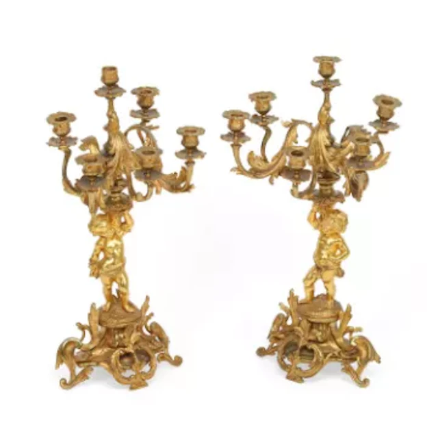A PAIR OF FRENCH GILT BRONZE SIX-LIGHT FIGURAL CANDELABRA