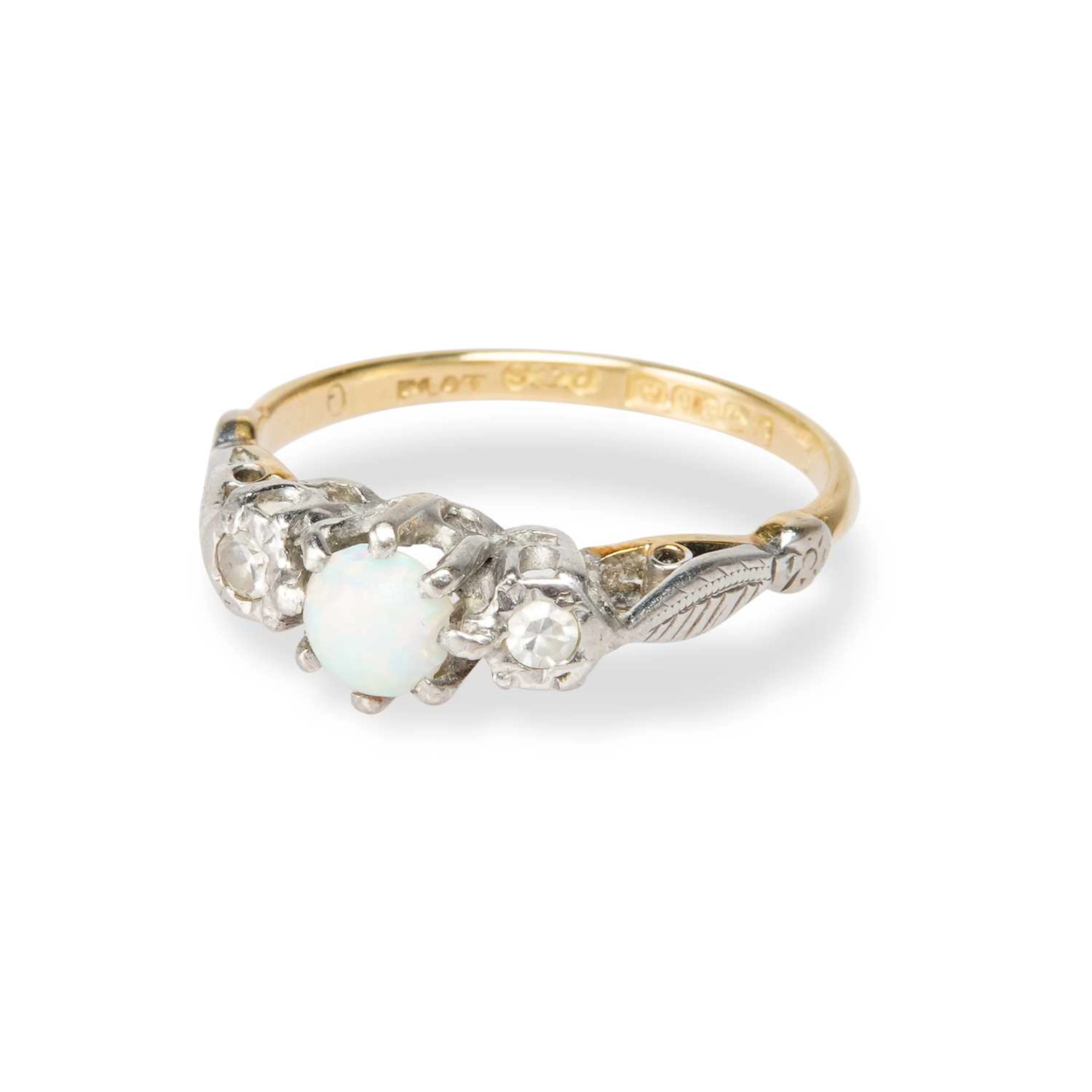 AN 18 CARAT GOLD OPAL AND DIAMOND RING