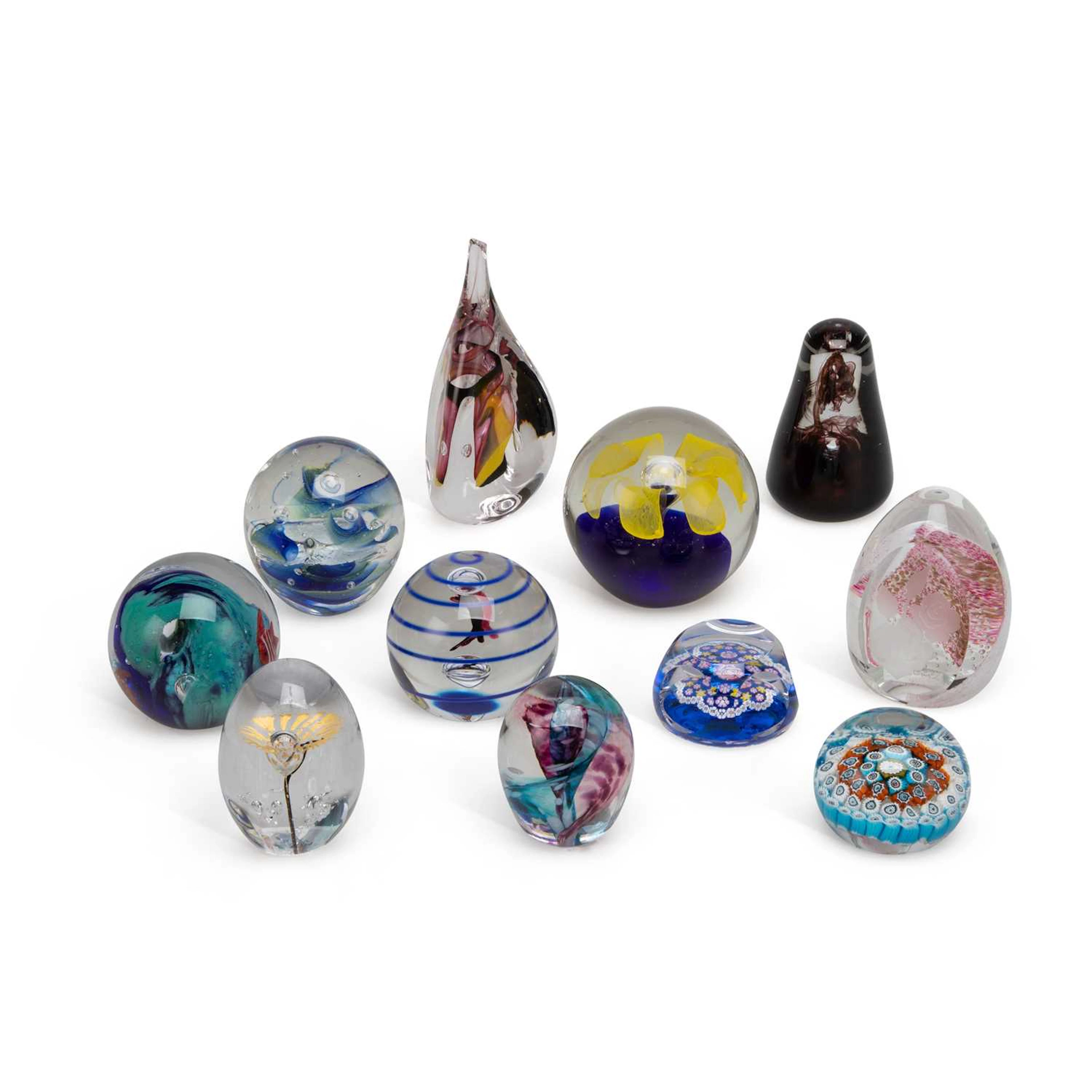 A COLLECTION OF GLASS PAPERWEIGHTS