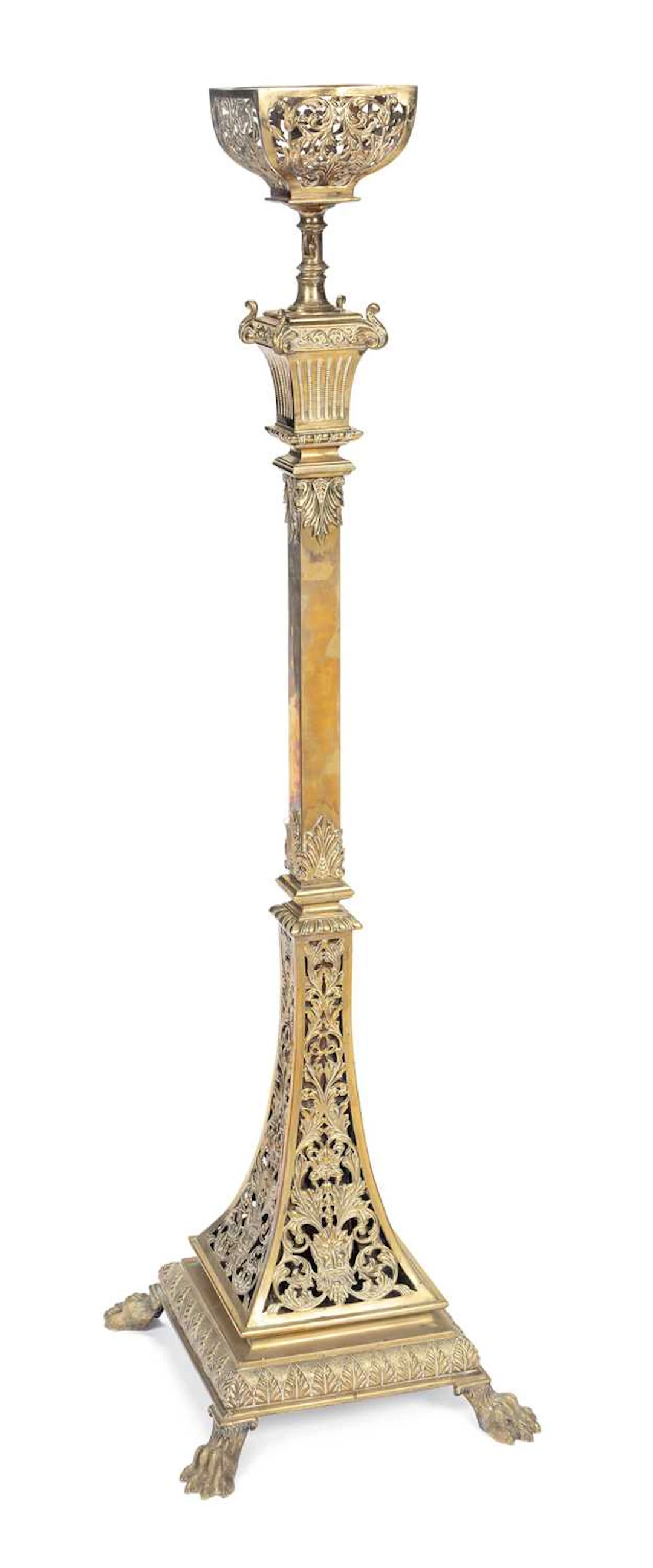 A LATE VICTORIAN BRASS STANDARD LAMP