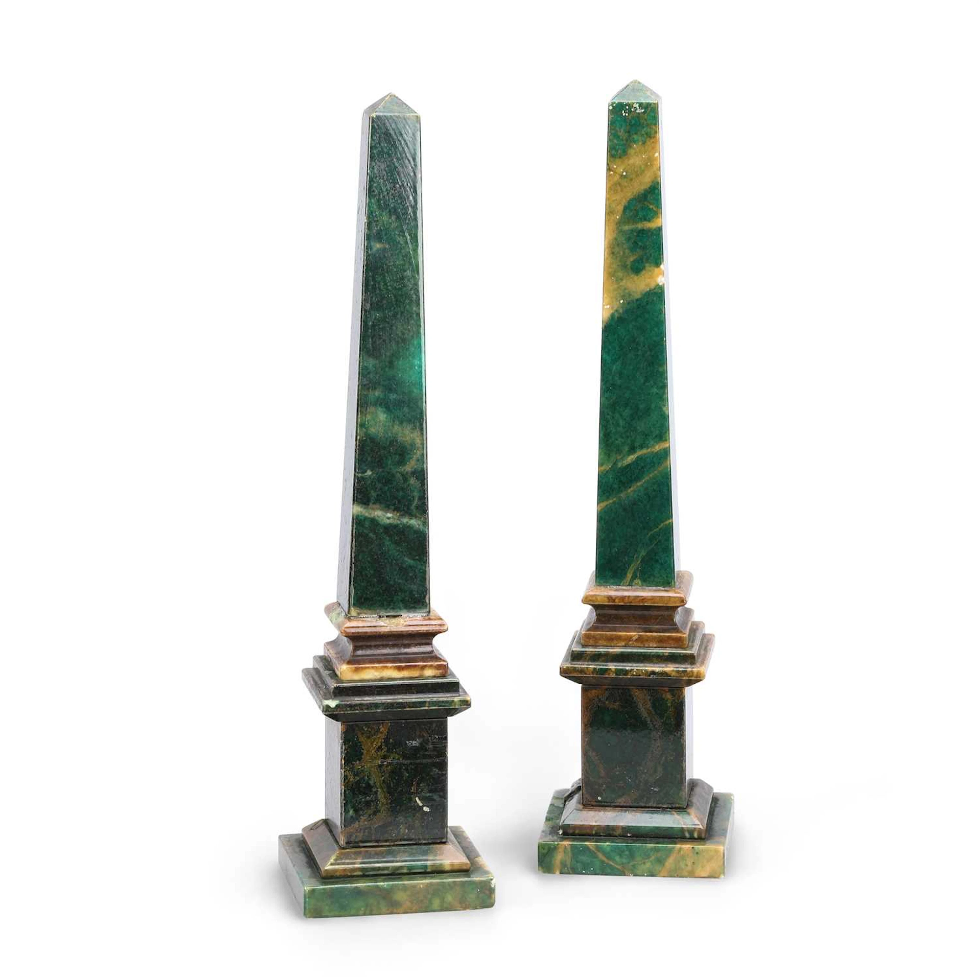 A PAIR OF SIMULATED MARBLE OBELISKS