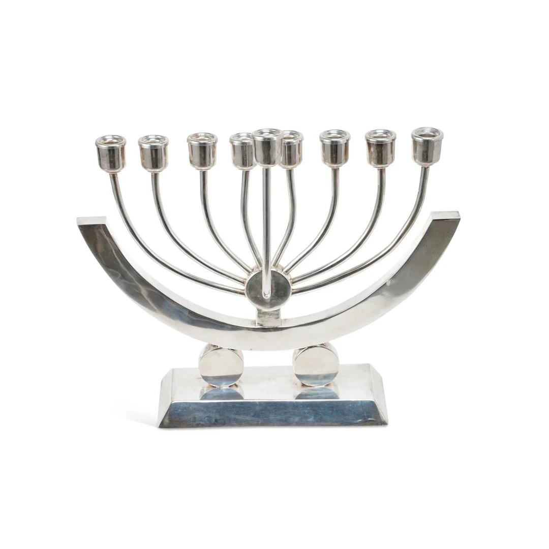 JUDAICA: A POLISH ART DECO SILVER MENORAH