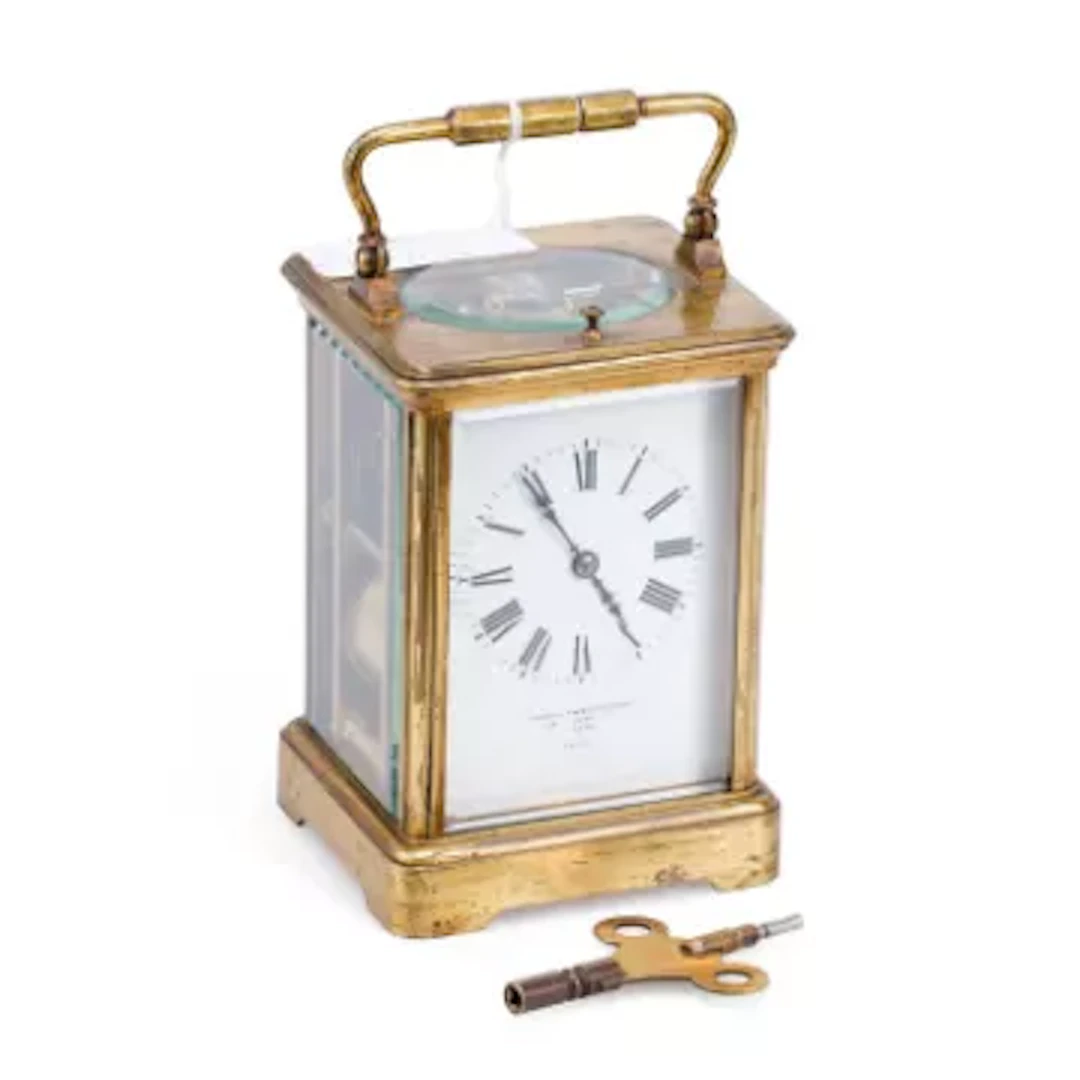 A FRENCH BRASS STRIKING CARRIAGE CLOCK