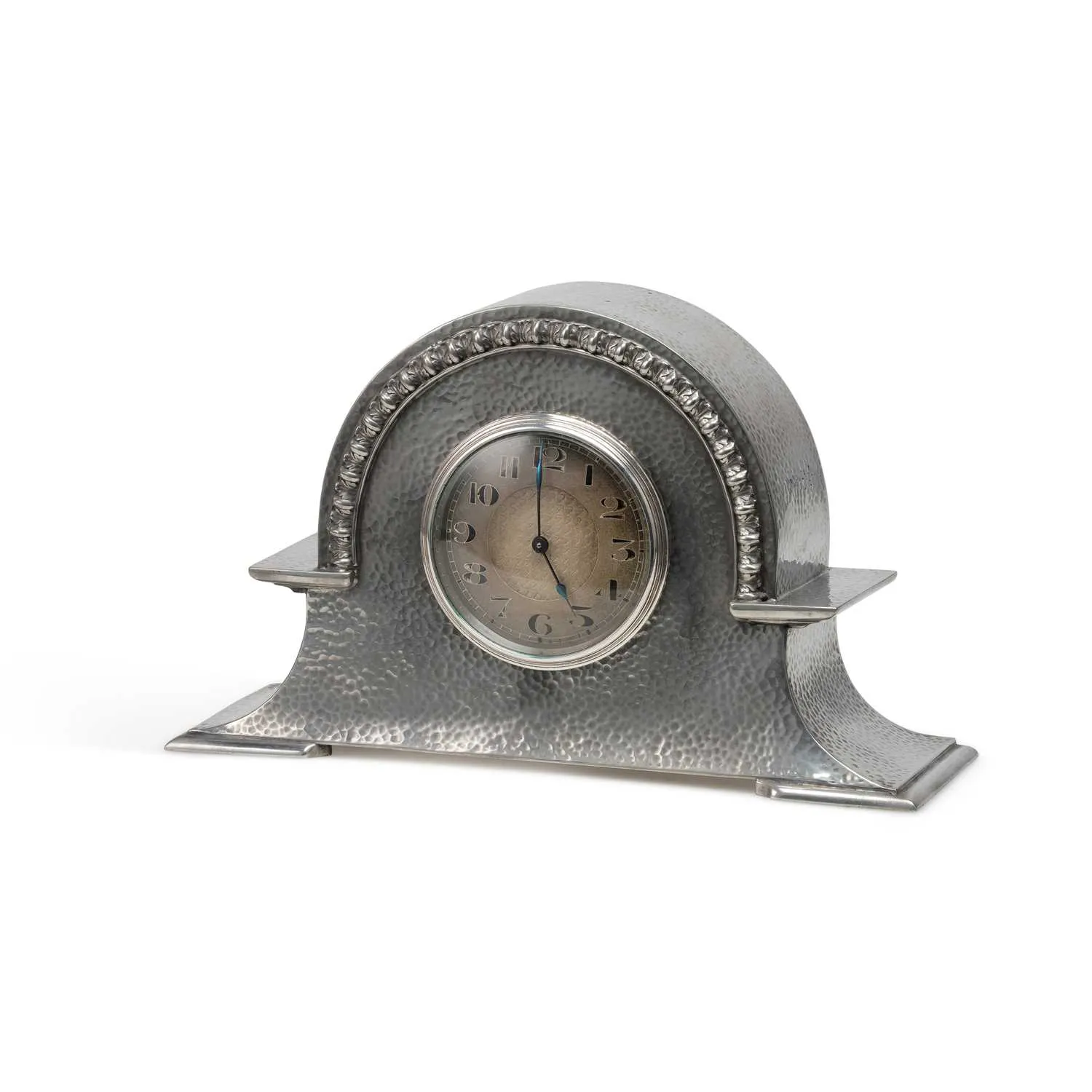 AN ARTS AND CRAFTS PEWTER MANTEL CLOCK