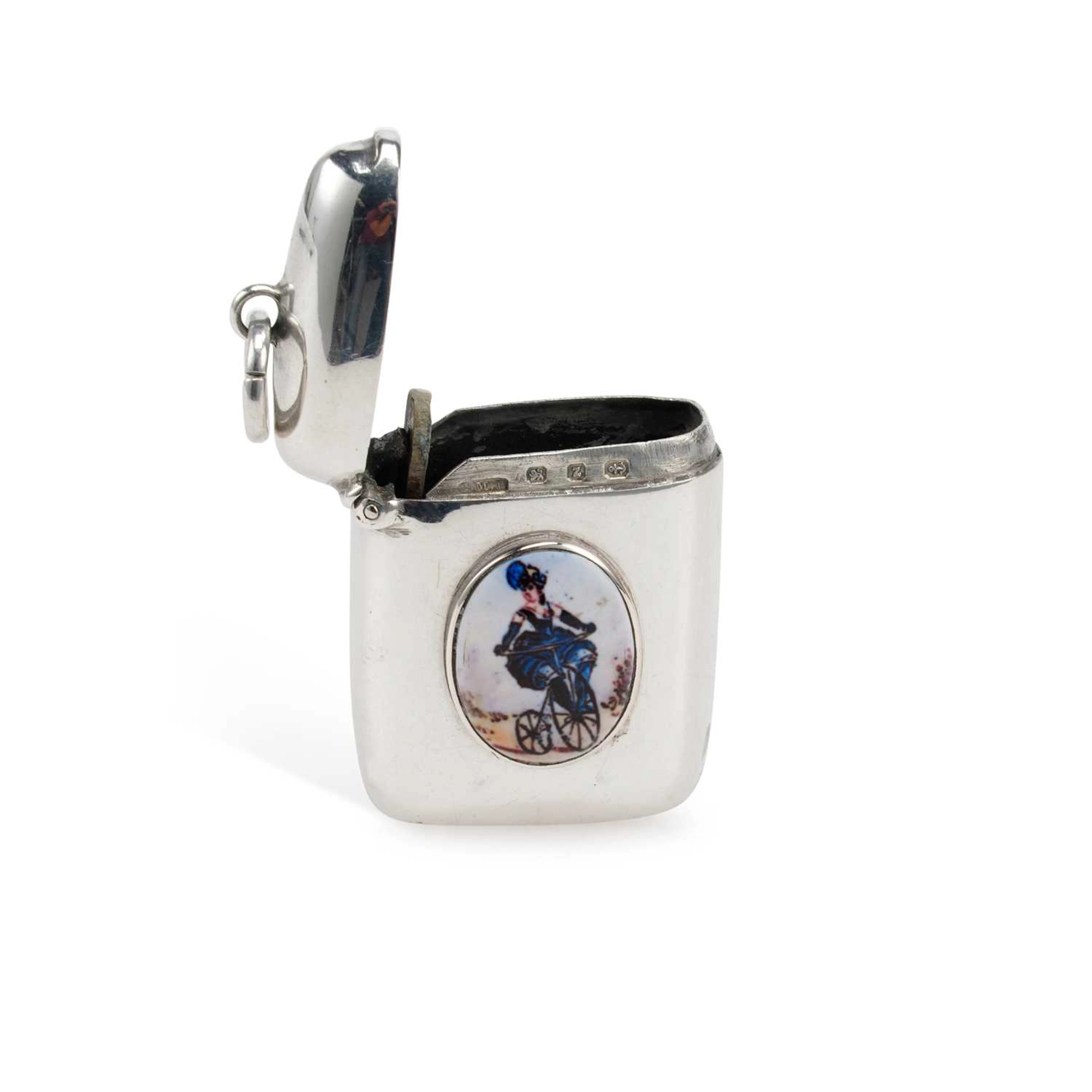 A LATE VICTORIAN SILVER AND ENAMEL VESTA CASE