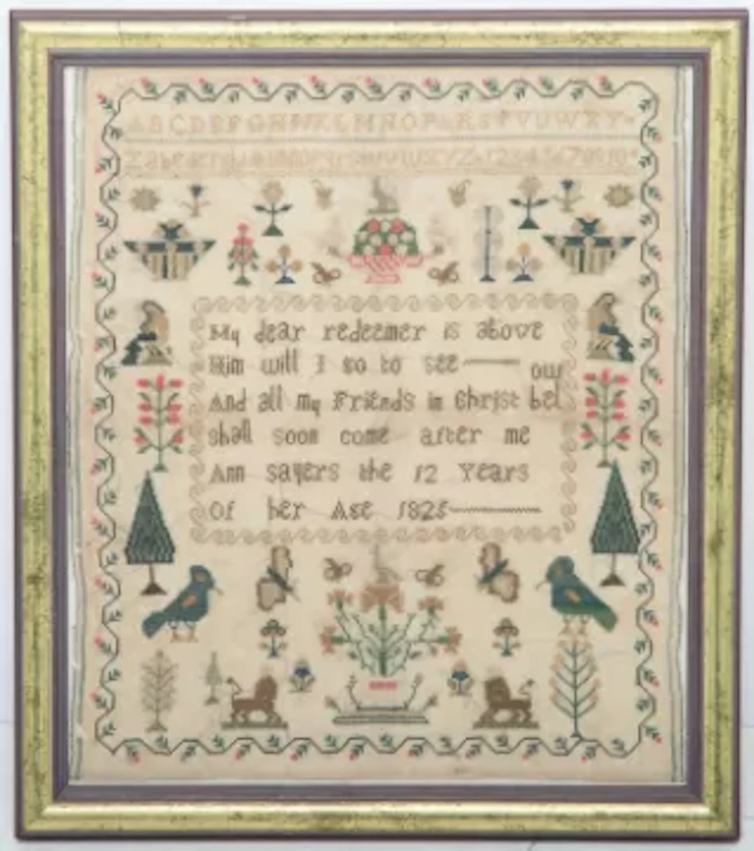 A GEORGE IV NEEDLEWORK SAMPLER