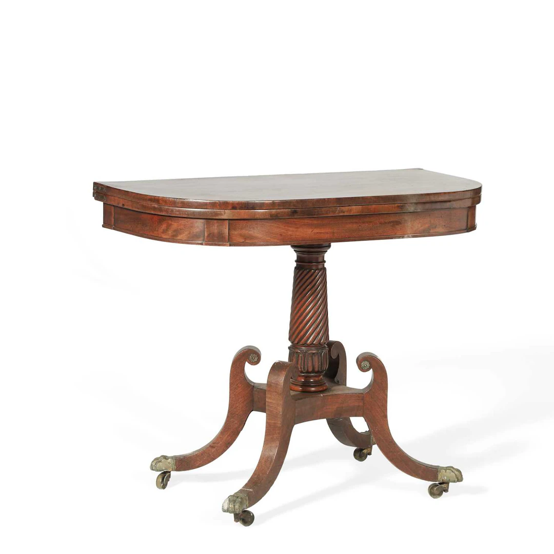 A REGENCY MAHOGANY FOLDOVER TEA TABLE