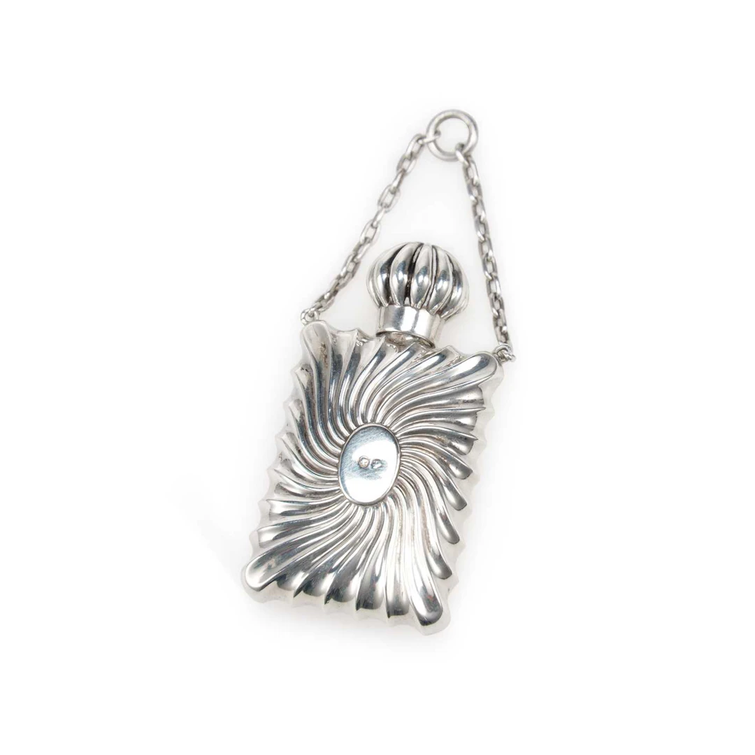A VICTORIAN SILVER SCENT BOTTLE