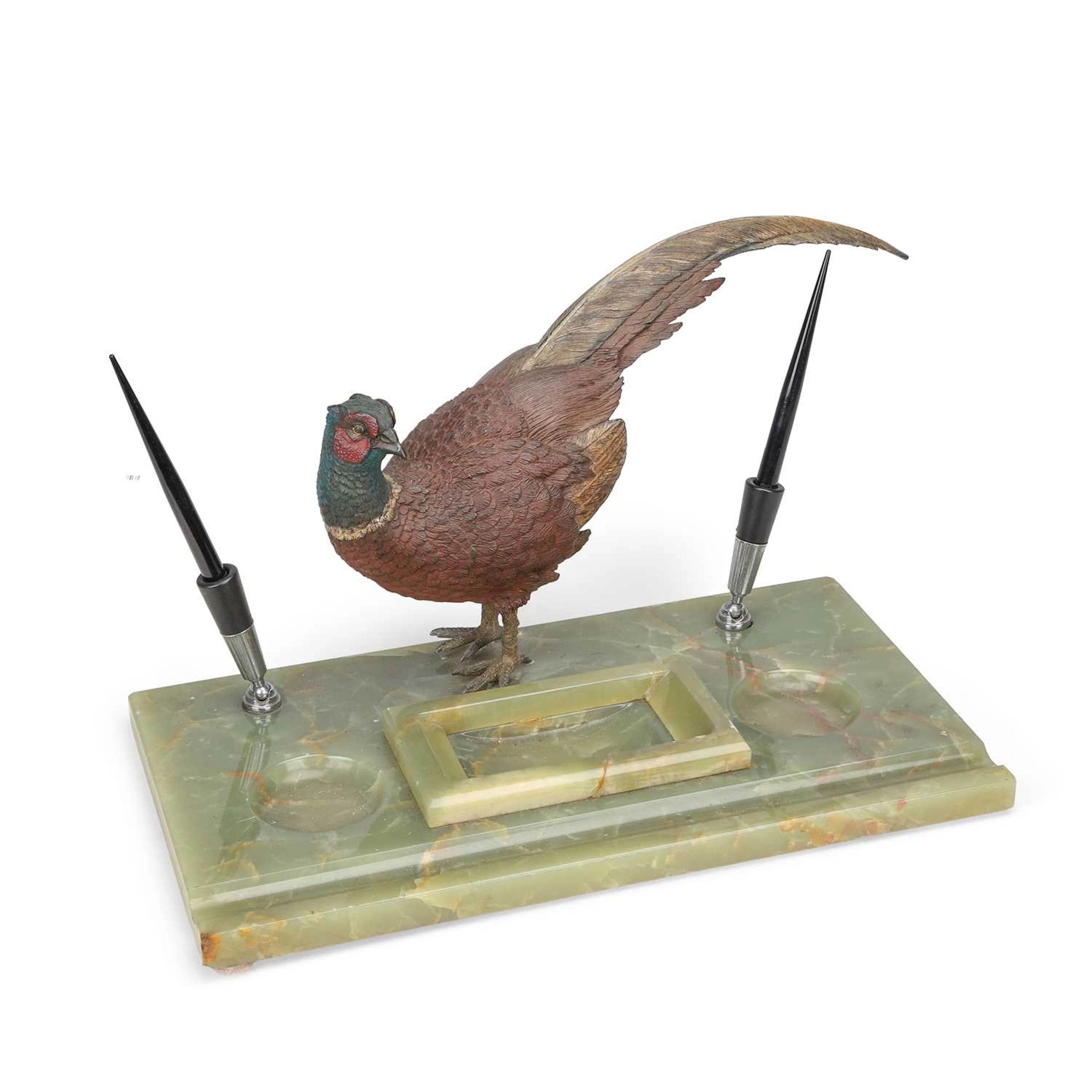 AN ART DECO ONYX AND COLD PAINTED BRONZE DESK STAND