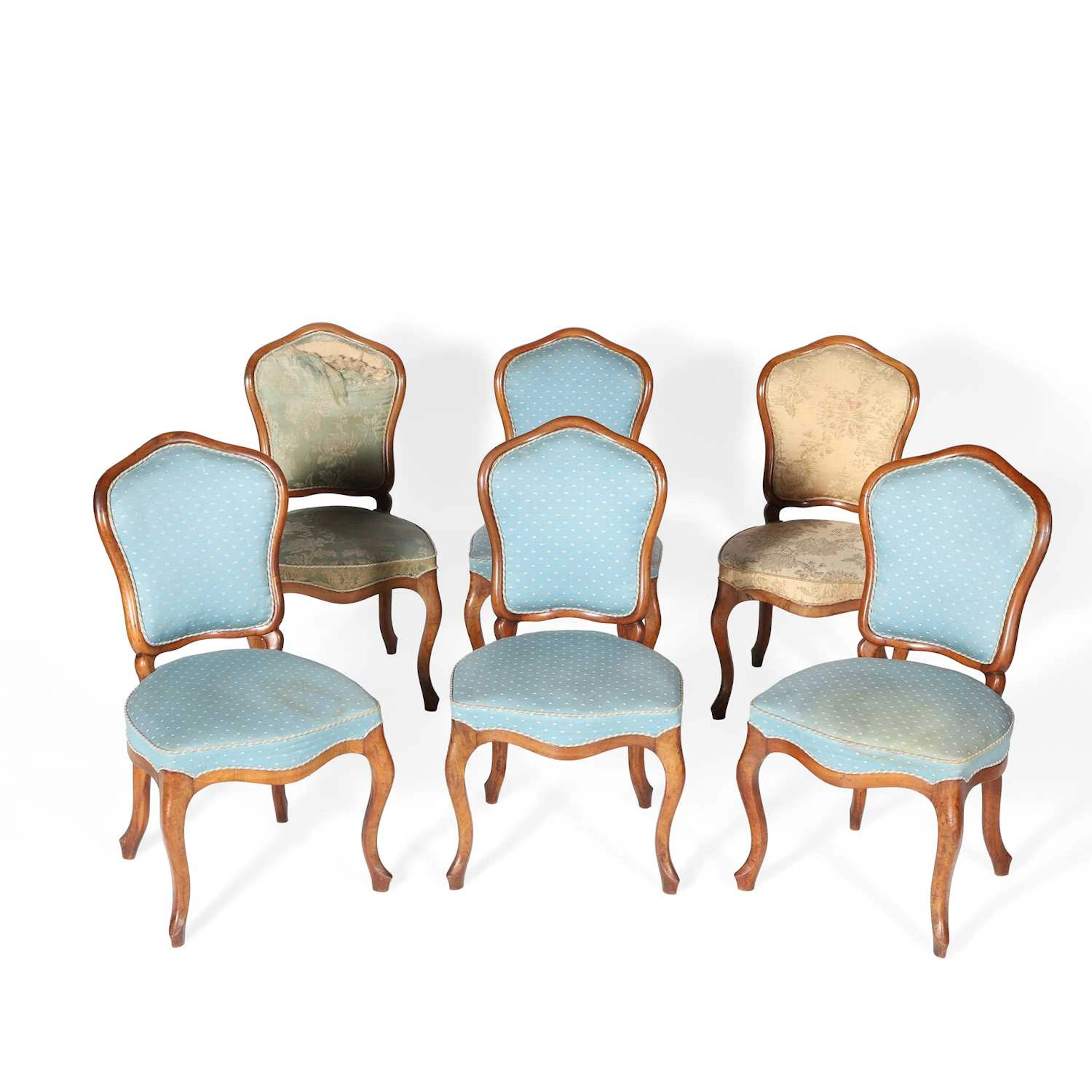 A SET OF SIX WALNUT SIDE CHAIRS