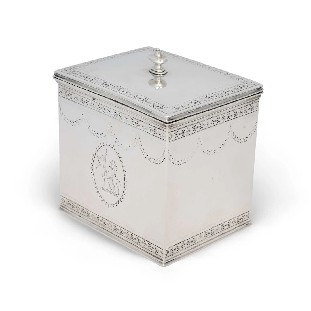 A GEORGE III SILVER TEA CADDY