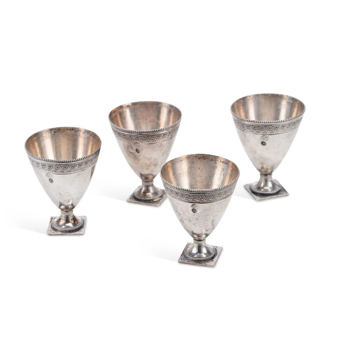 A SET OF FOUR OTTOMAN SILVER ZARF CUPS