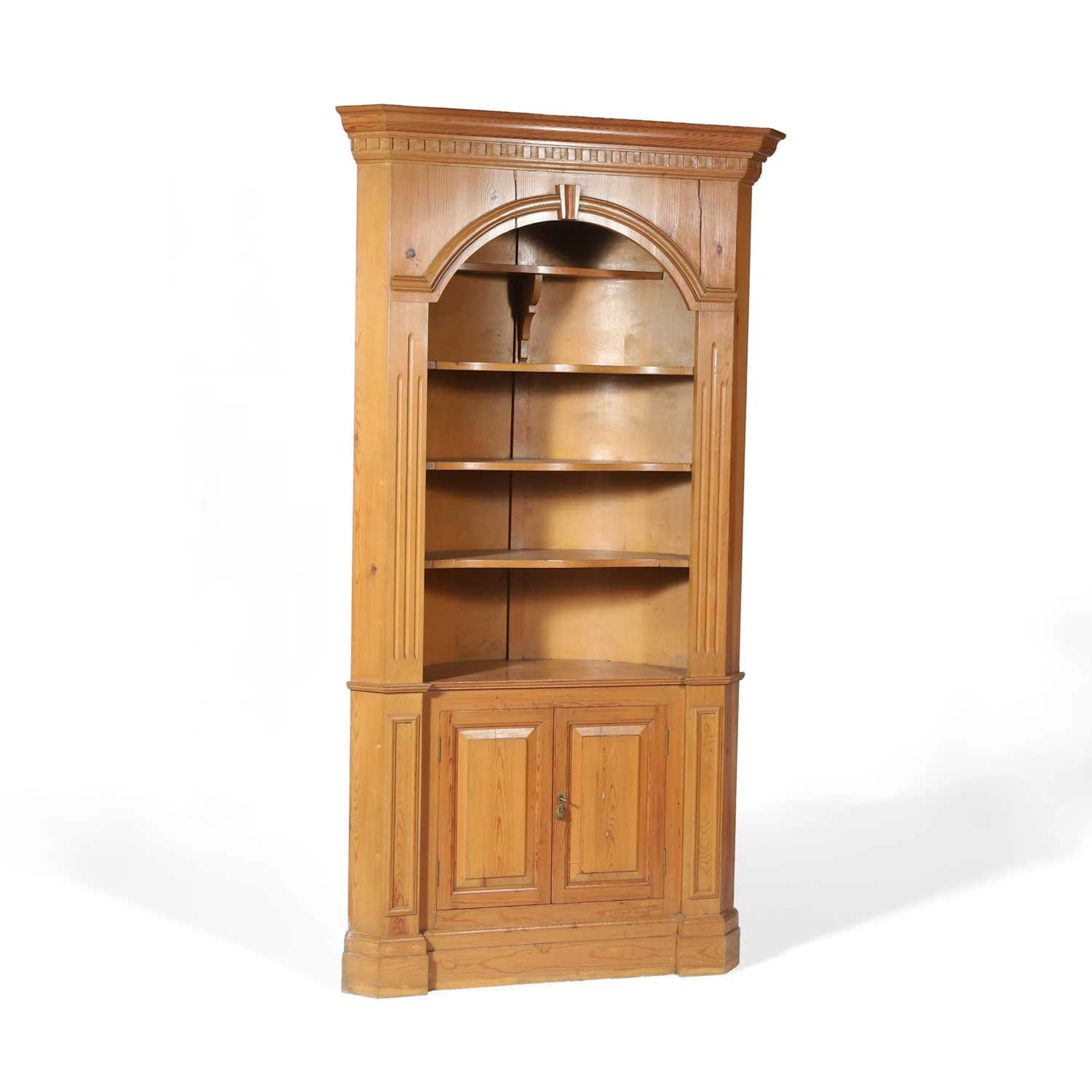 A PINE FLOOR STANDING CORNER CABINET