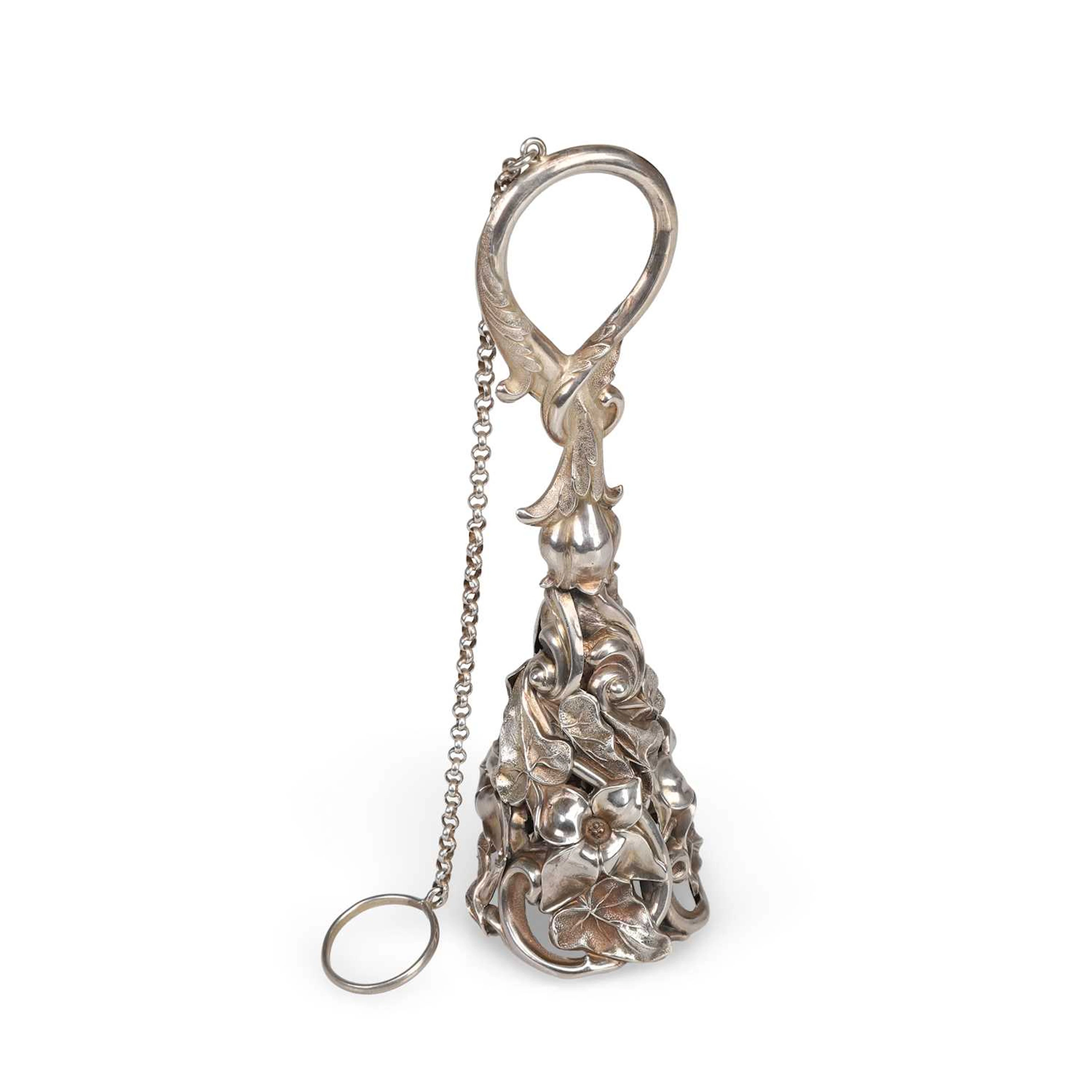 A VICTORIAN SILVERED METAL POSY HOLDER CAST WITH IVY LEAVES AND FLOWERHEADS
