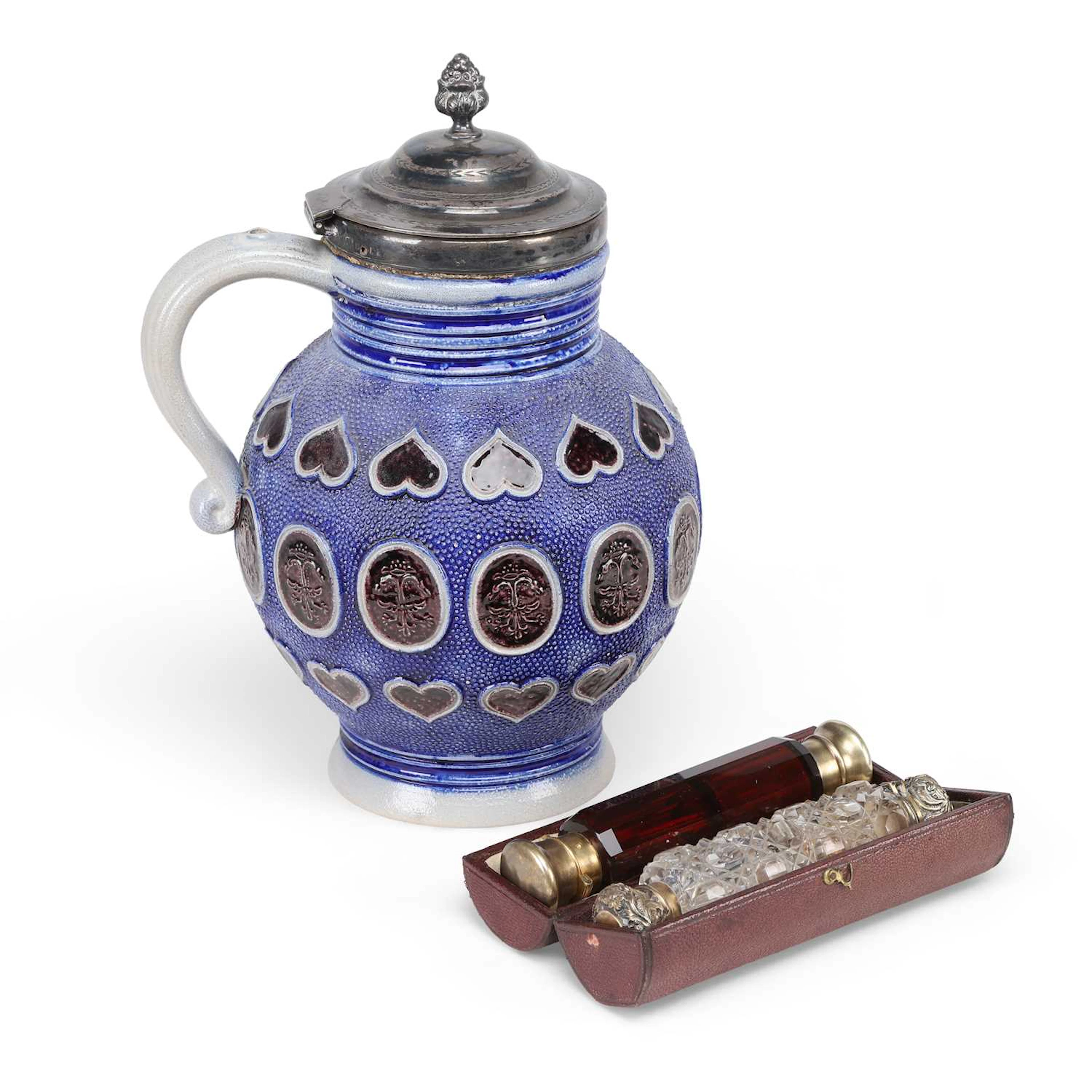 A WESTERWALD STONEWARE JUG AND TWO SCENT BOTTLES
