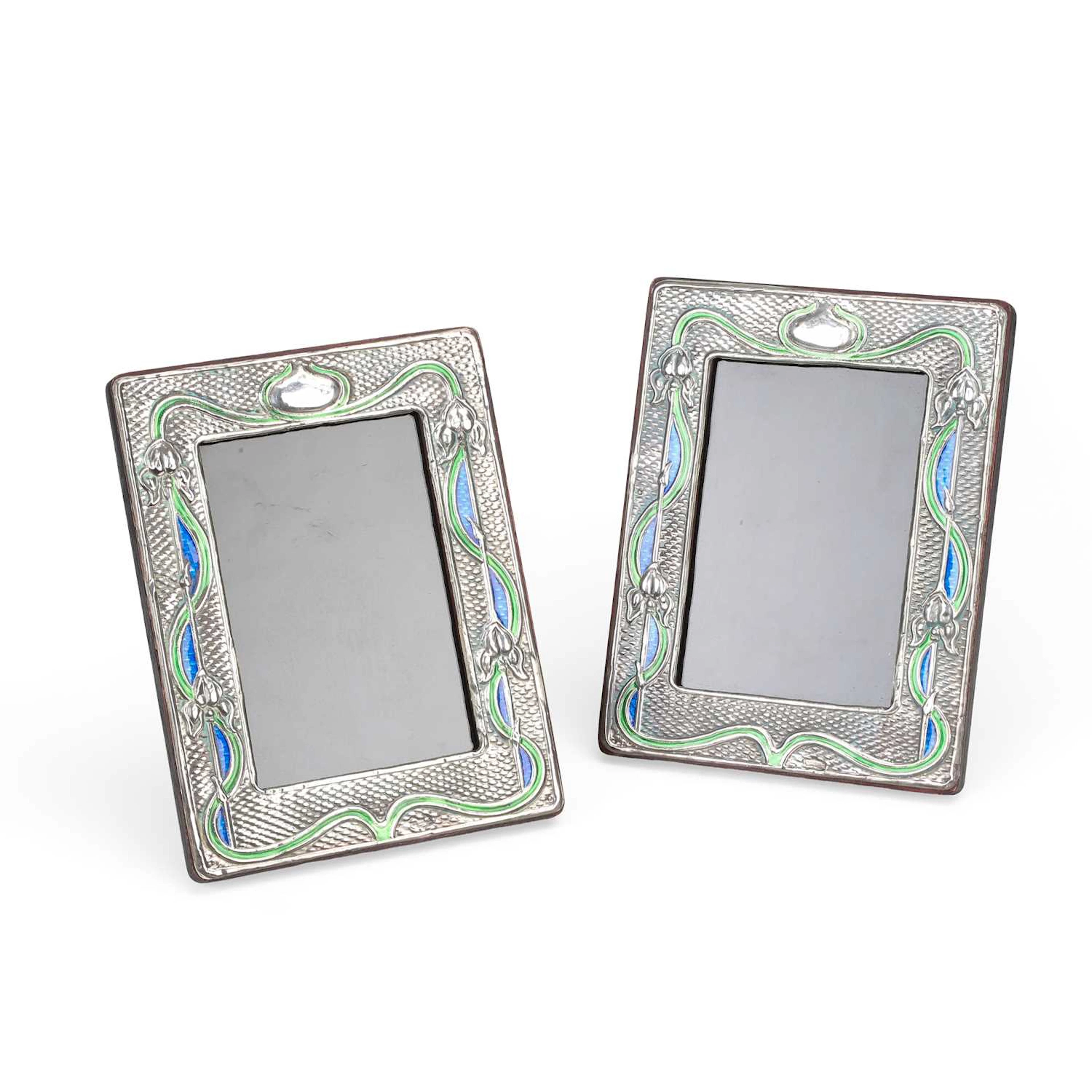 A PAIR OF MODERN ART NOUVEAU STYLE SILVER-MOUNTED ENAMELLED PHOTOGRAPH FRAMES