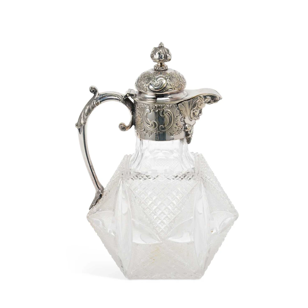 A VICTORIAN SILVER-PLATED AND CUT-GLASS CLARET JUG