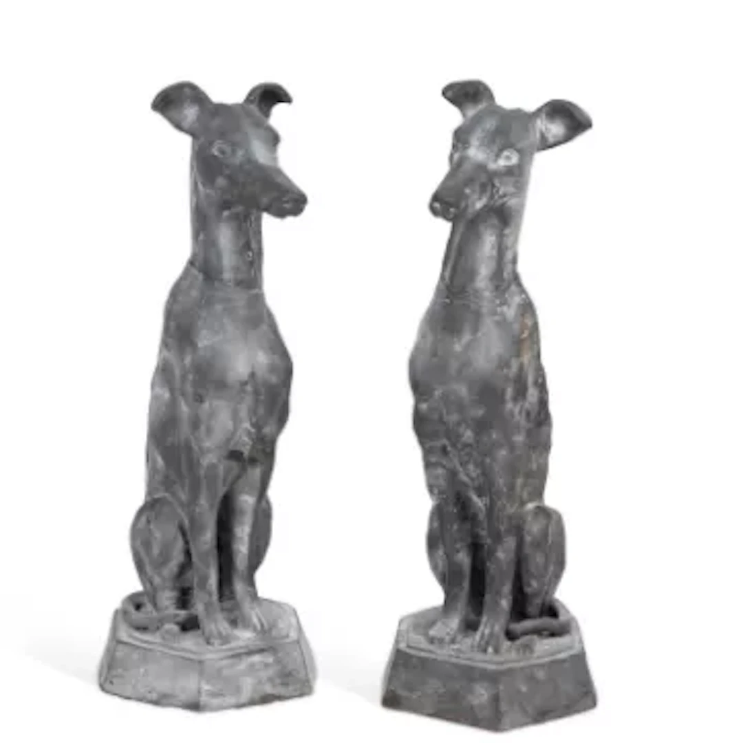 A PAIR OF CAST METAL MODELS OF SEATED WHIPPETS